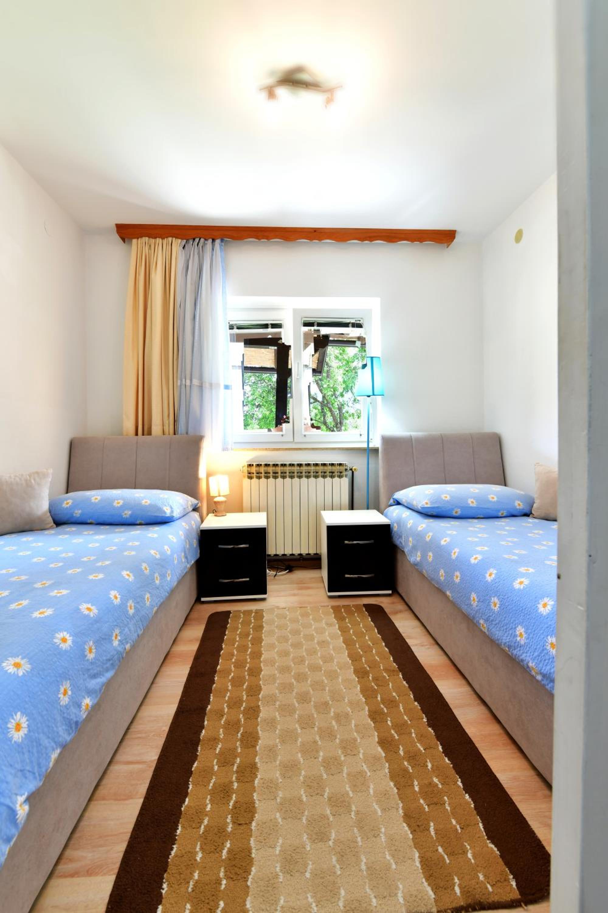 Three-Bedroom Apartment - Photo 37