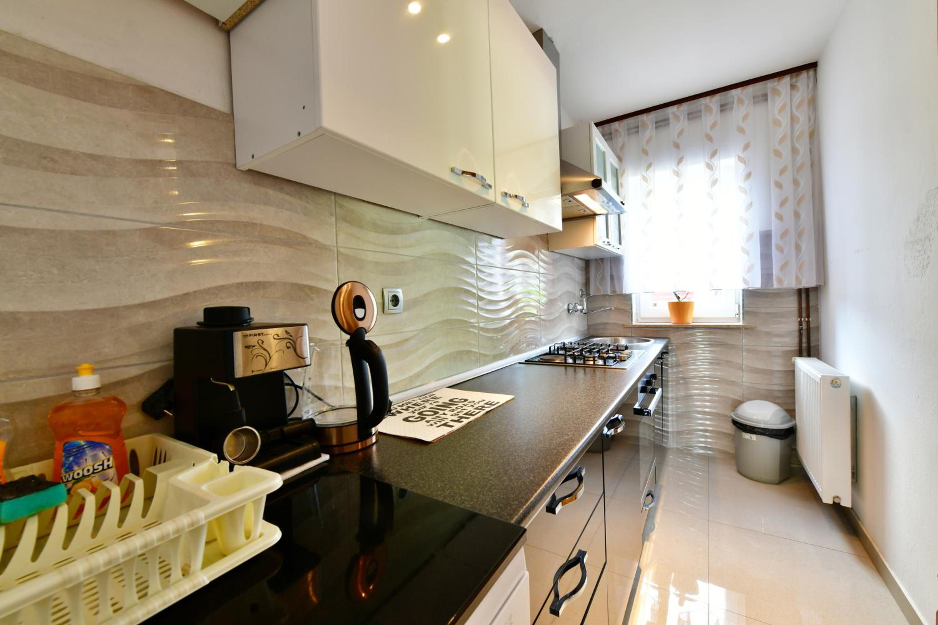 Three-Bedroom Apartment - Photo 15