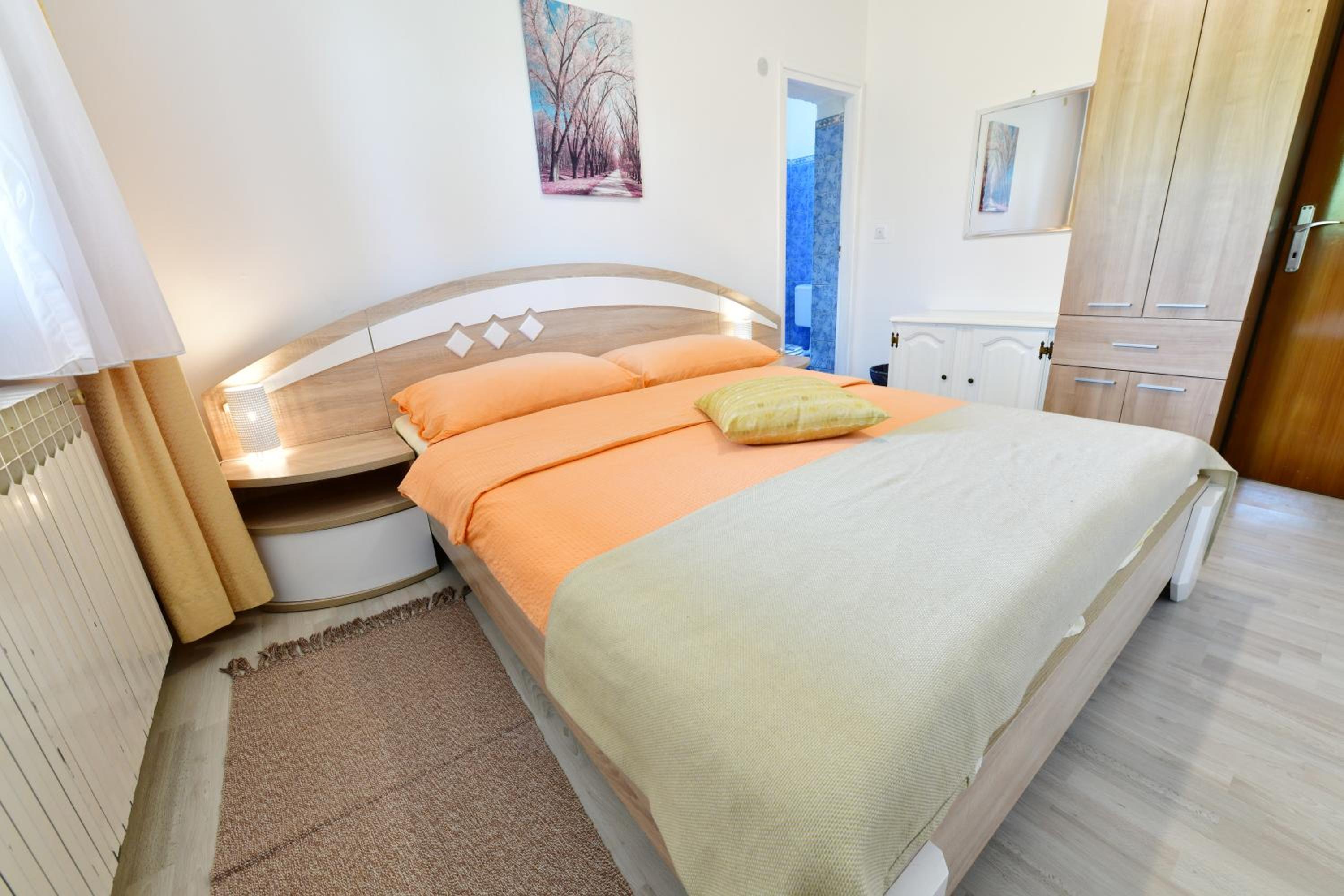Three-Bedroom Apartment - Photo 19