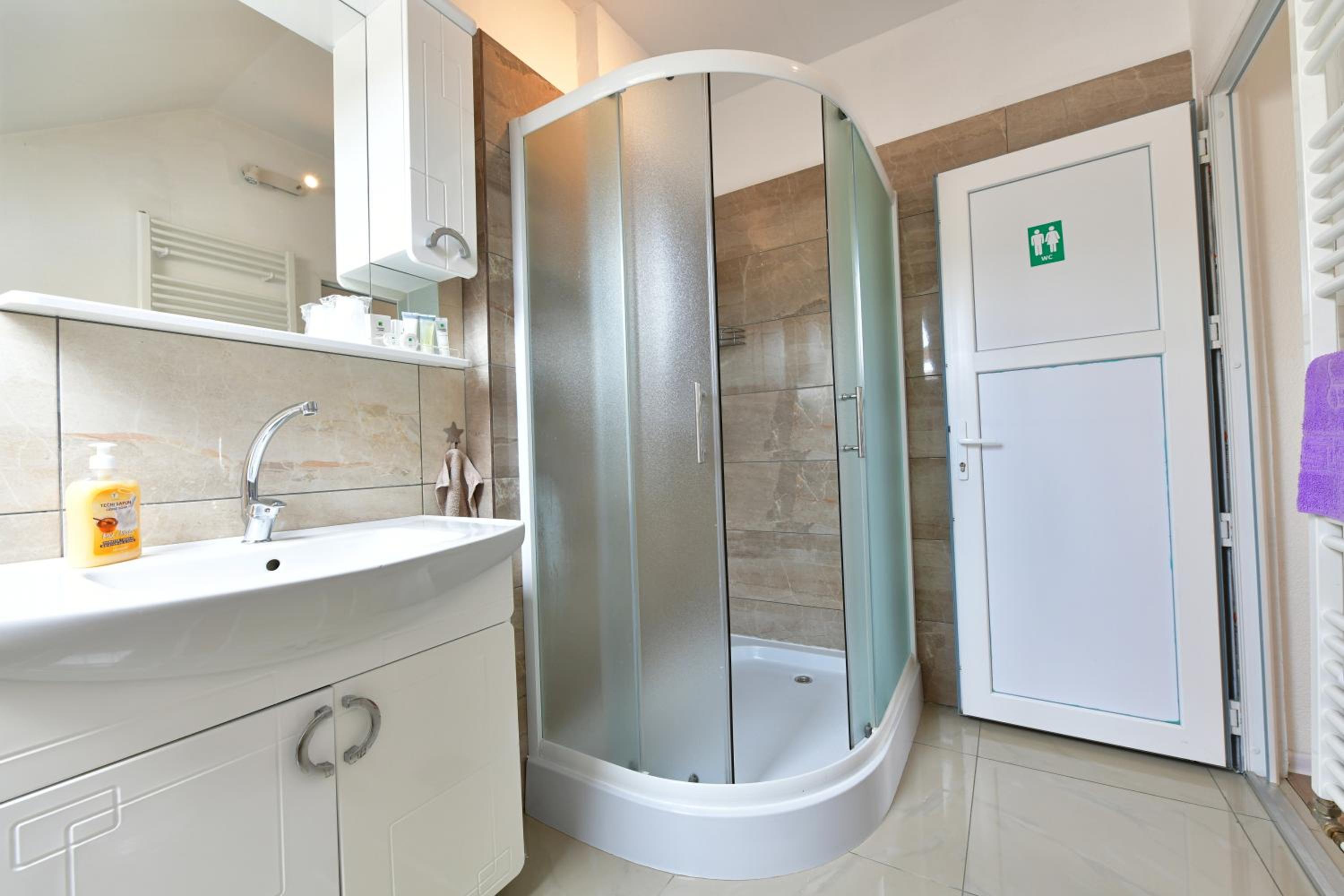Three-Bedroom Apartment - Photo 33
