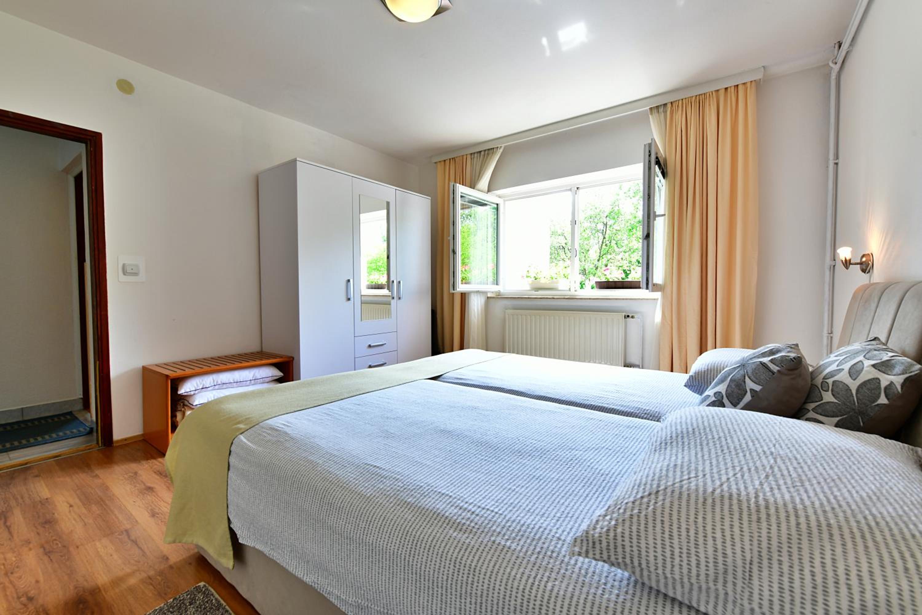 Three-Bedroom Apartment - Photo 39