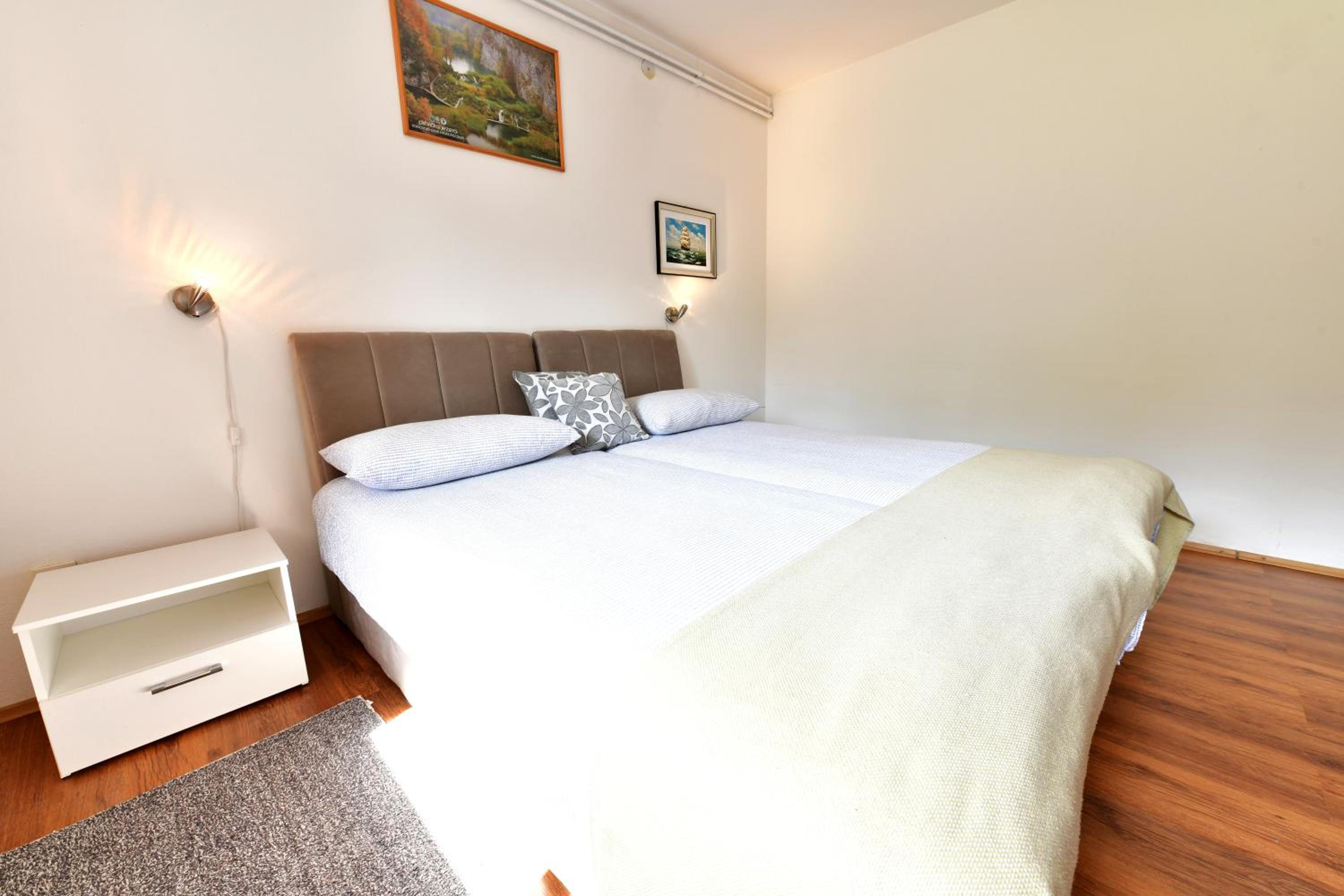 Three-Bedroom Apartment - Photo 40