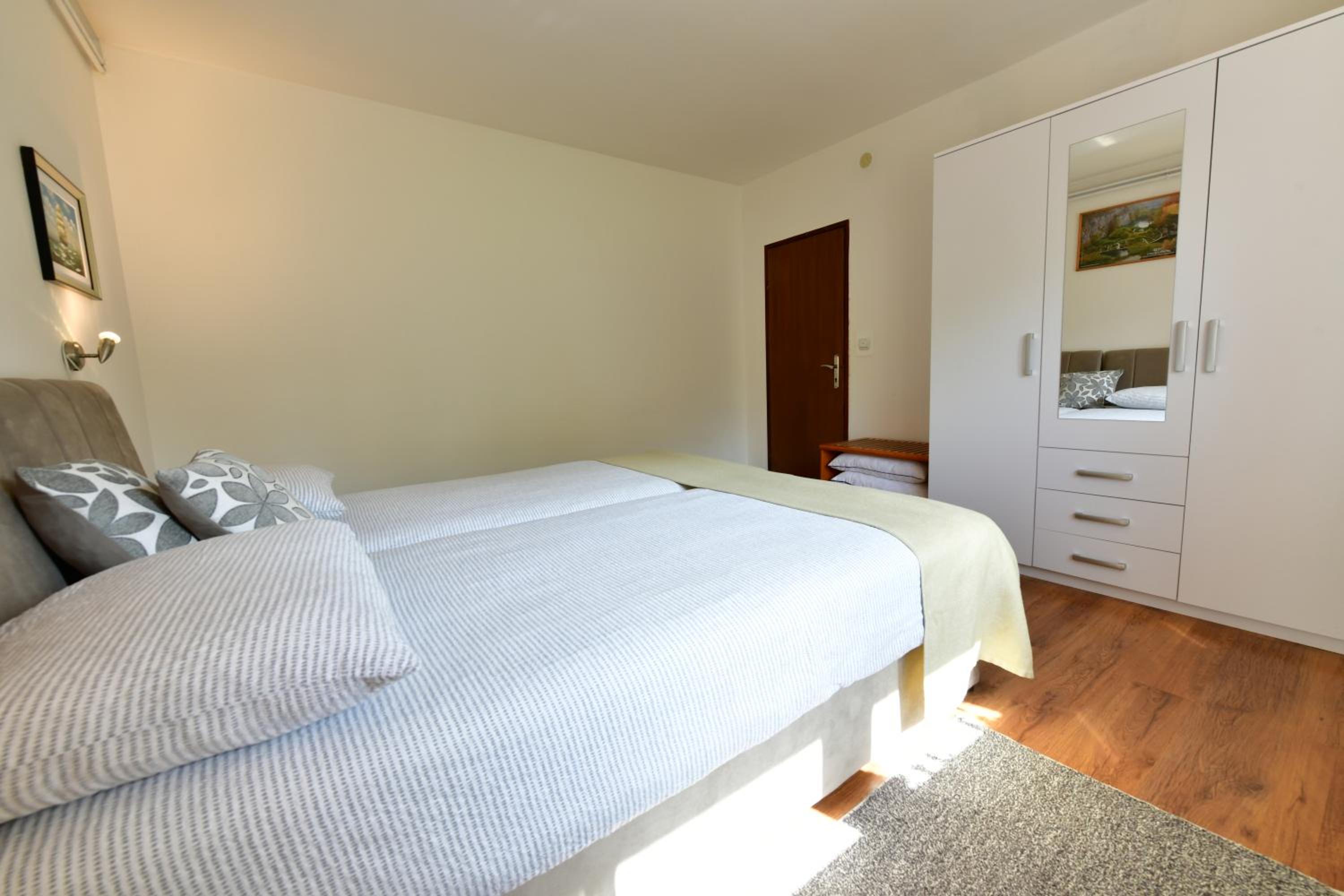 Three-Bedroom Apartment - Photo 50