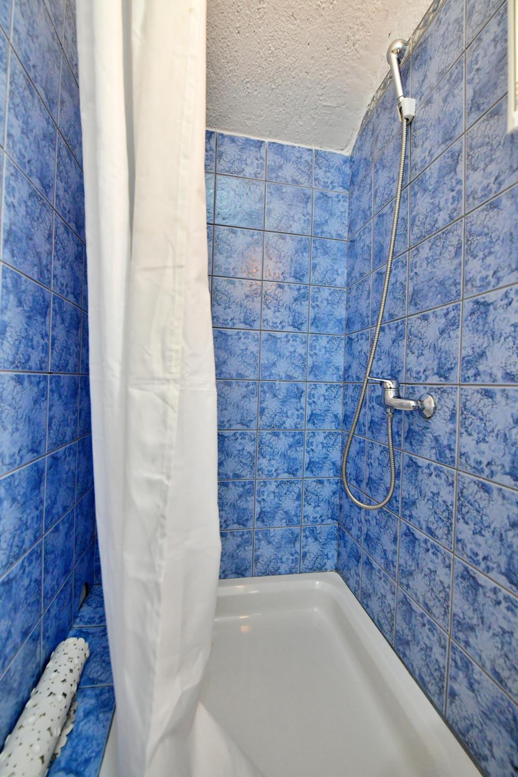 Three-Bedroom Apartment - Photo 51