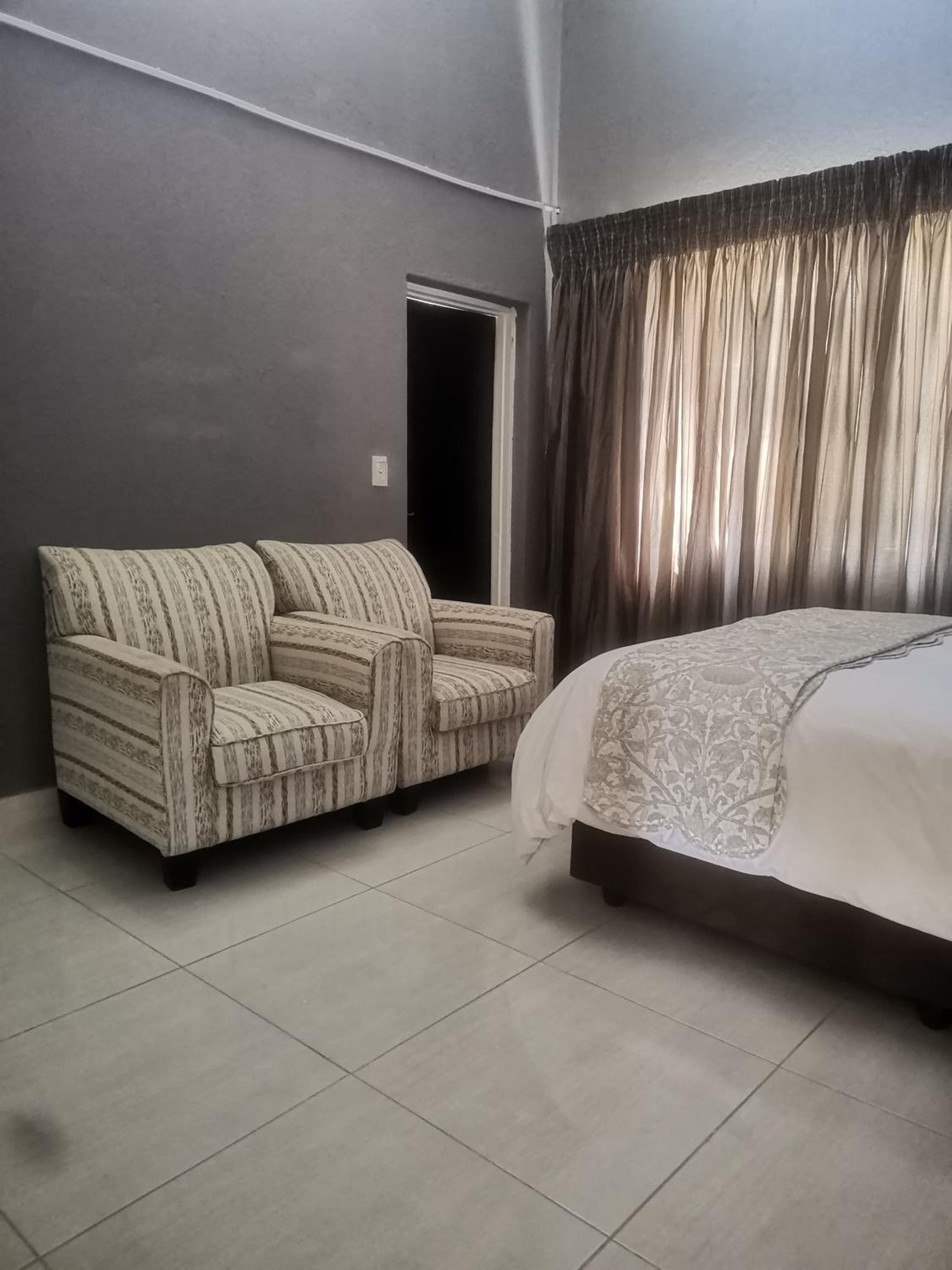 Four-Bedroom House - Photo 37