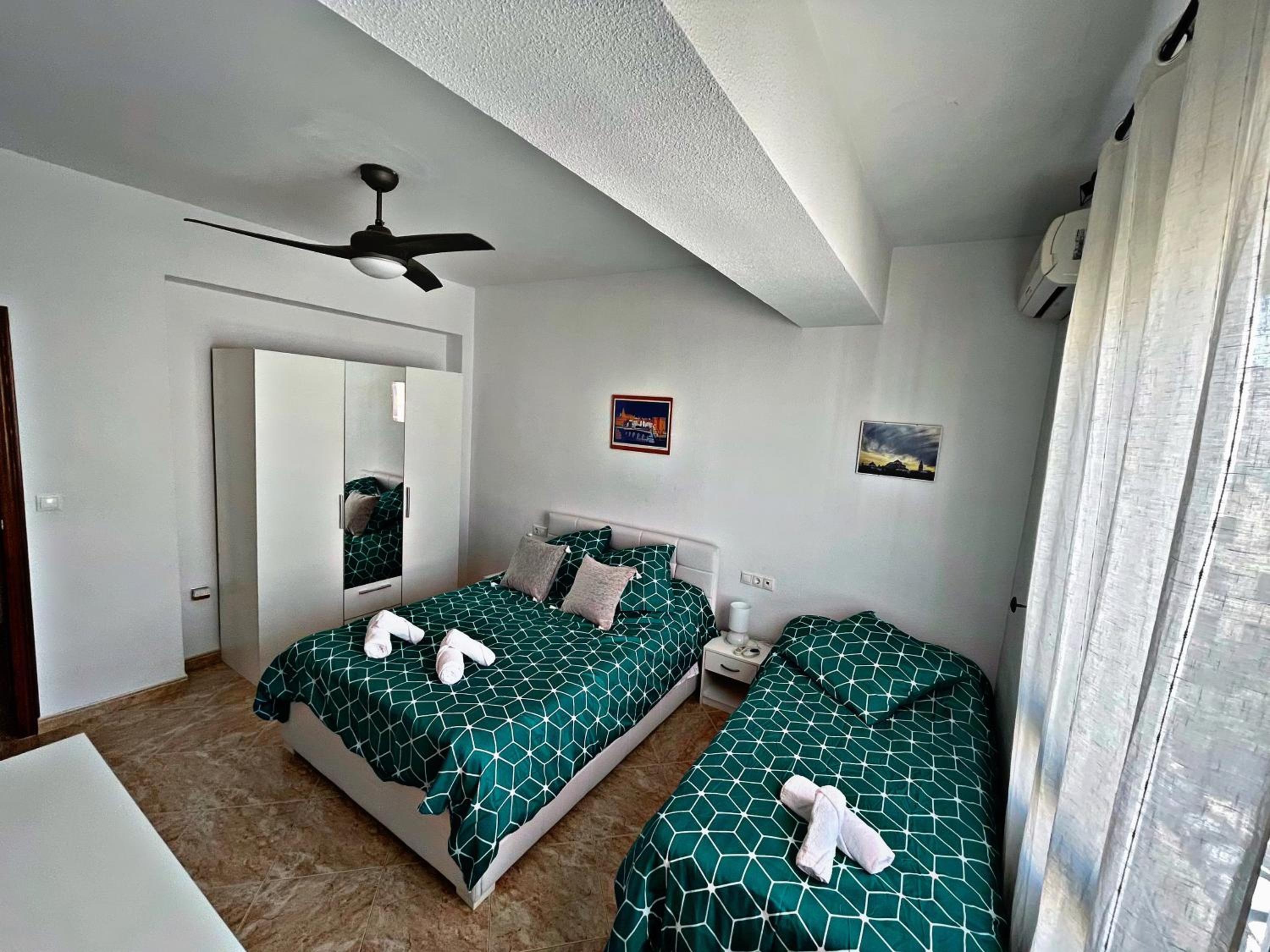 Three-Bedroom Apartment - Photo 4