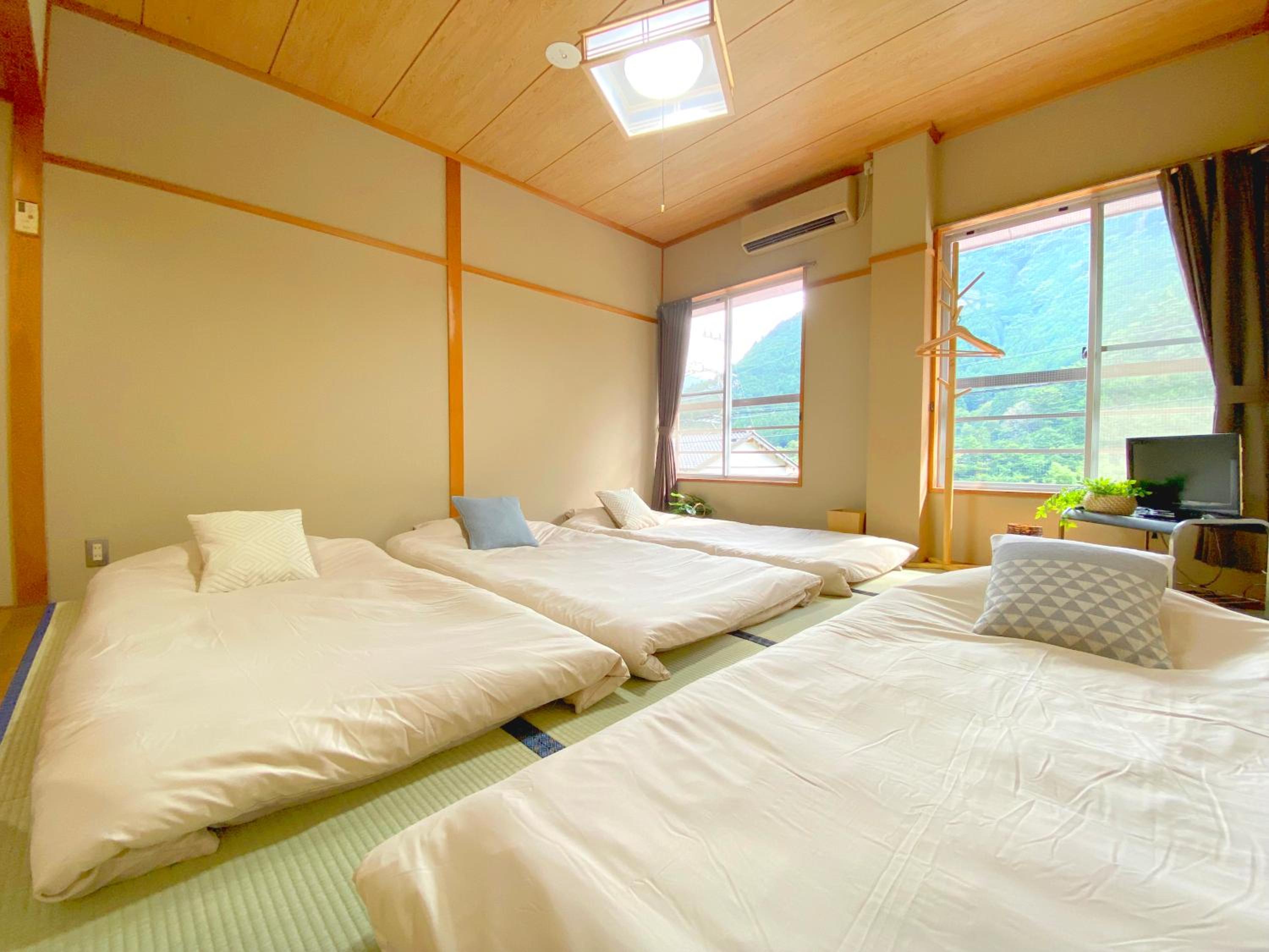 Three-Bedroom Apartment - Photo 19