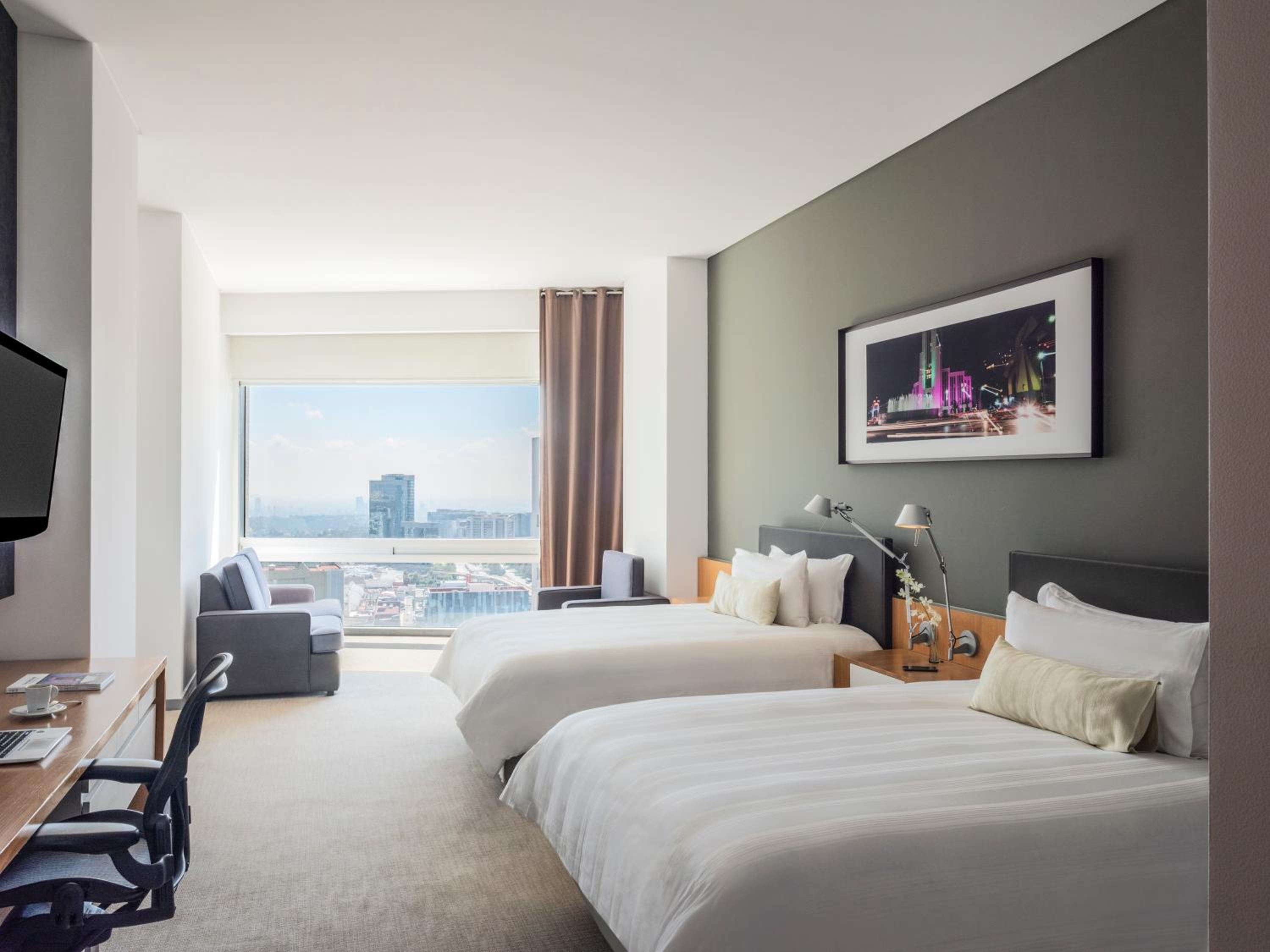 Premier Queen Room with Two Queen Beds and View - Photo 2