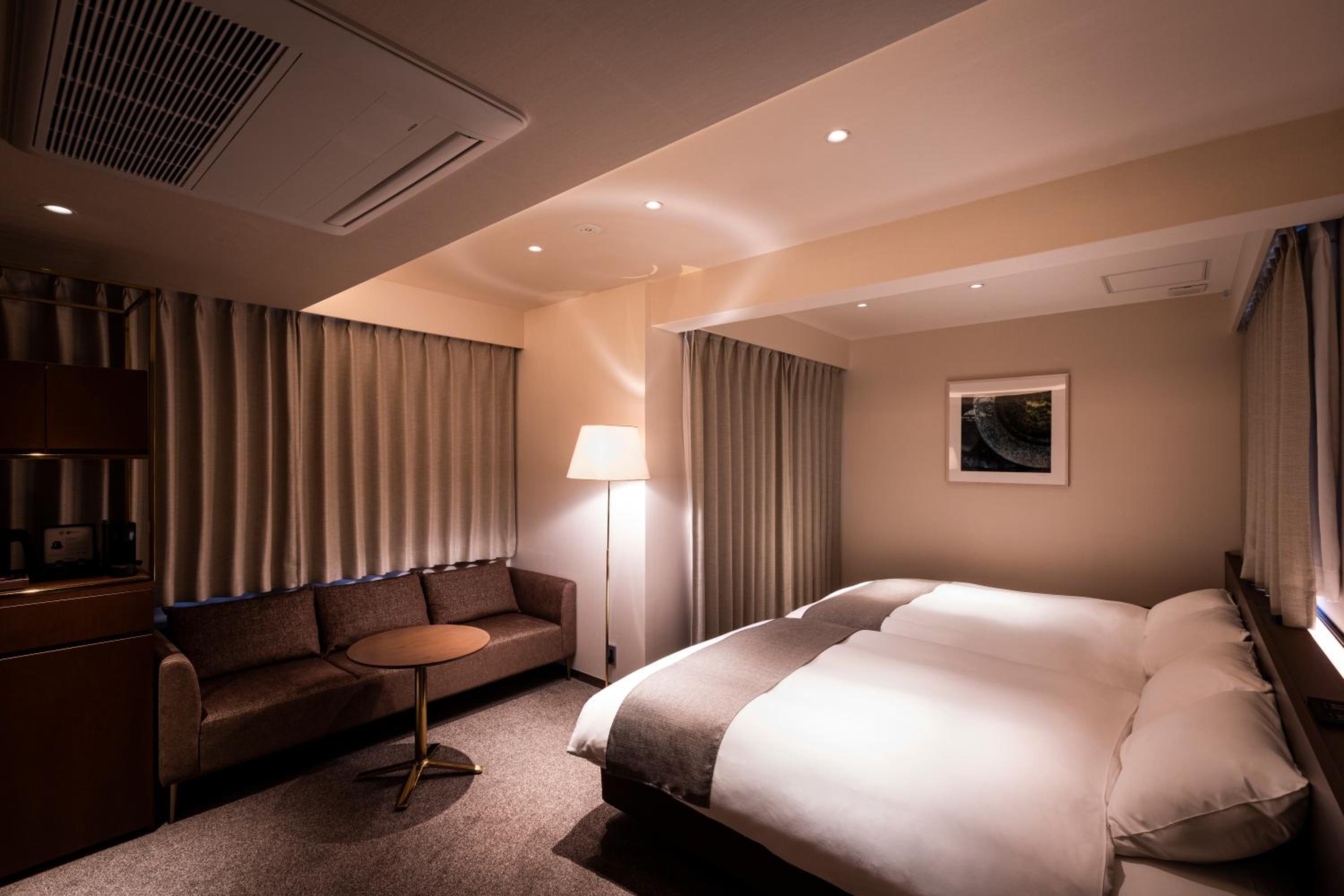 Deluxe Double Room - Photo 11
