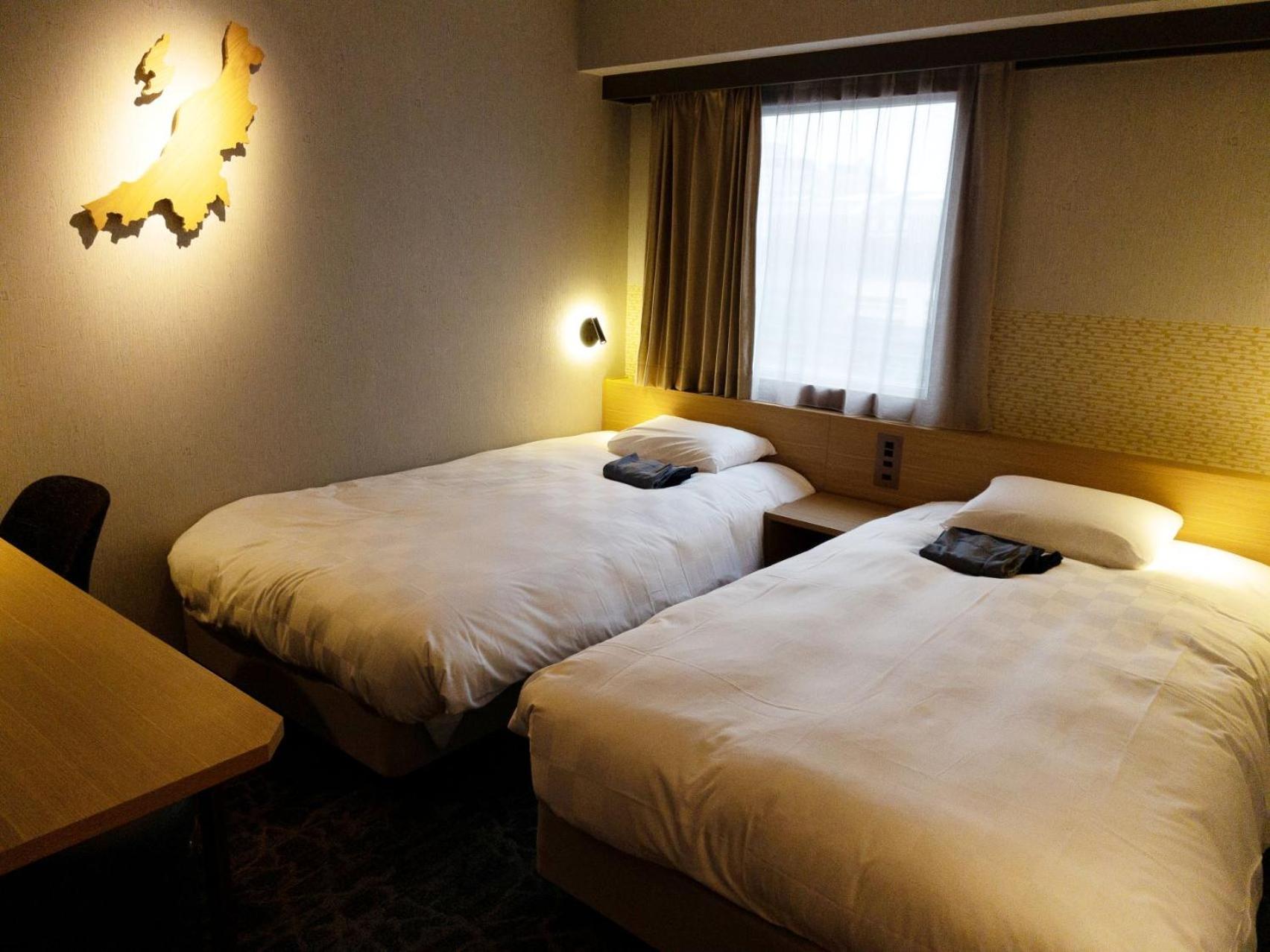 Twin Room - Non-Smoking - Photo 1
