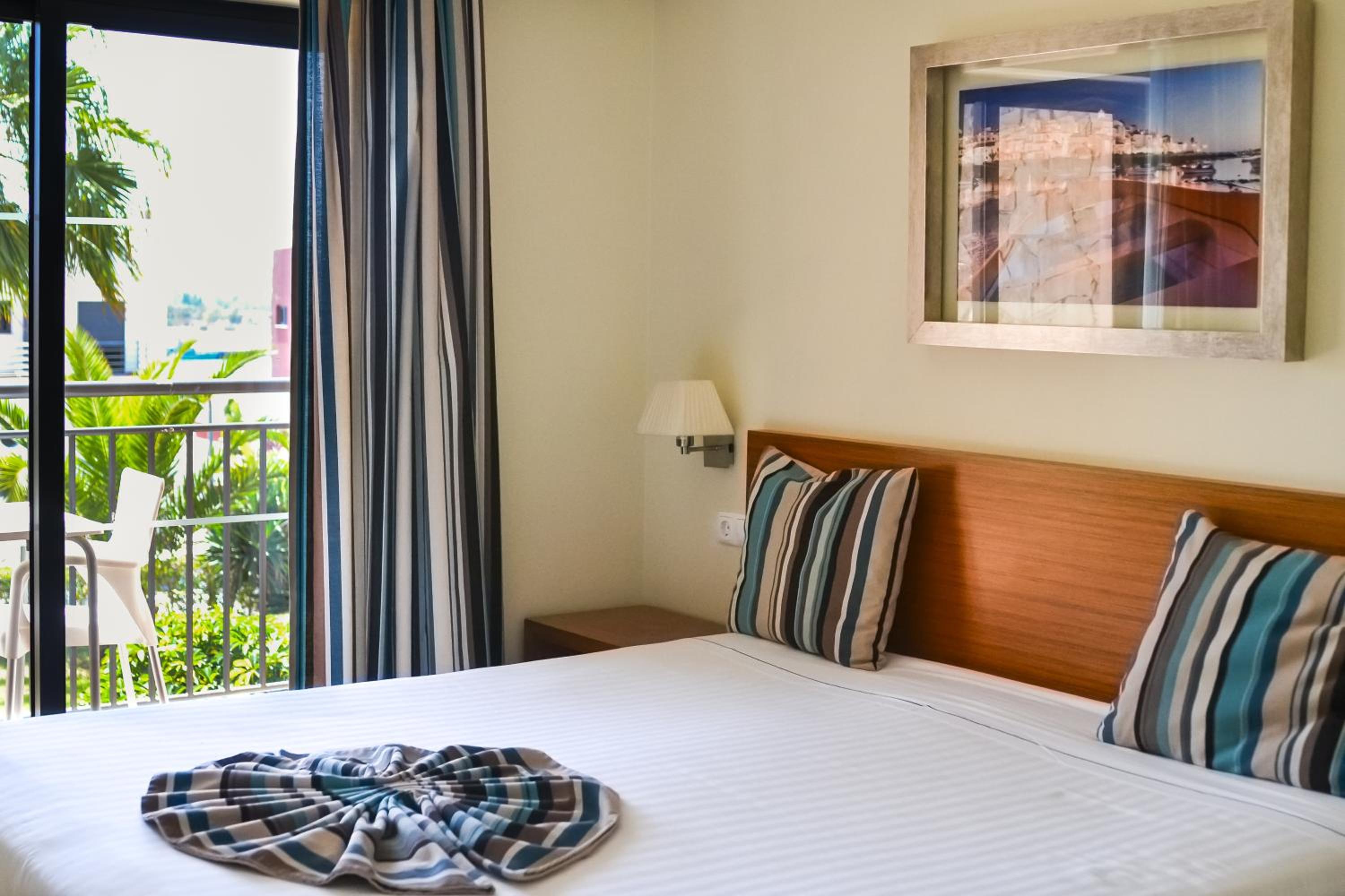 One-Bedroom Apartment with Pool or River View
