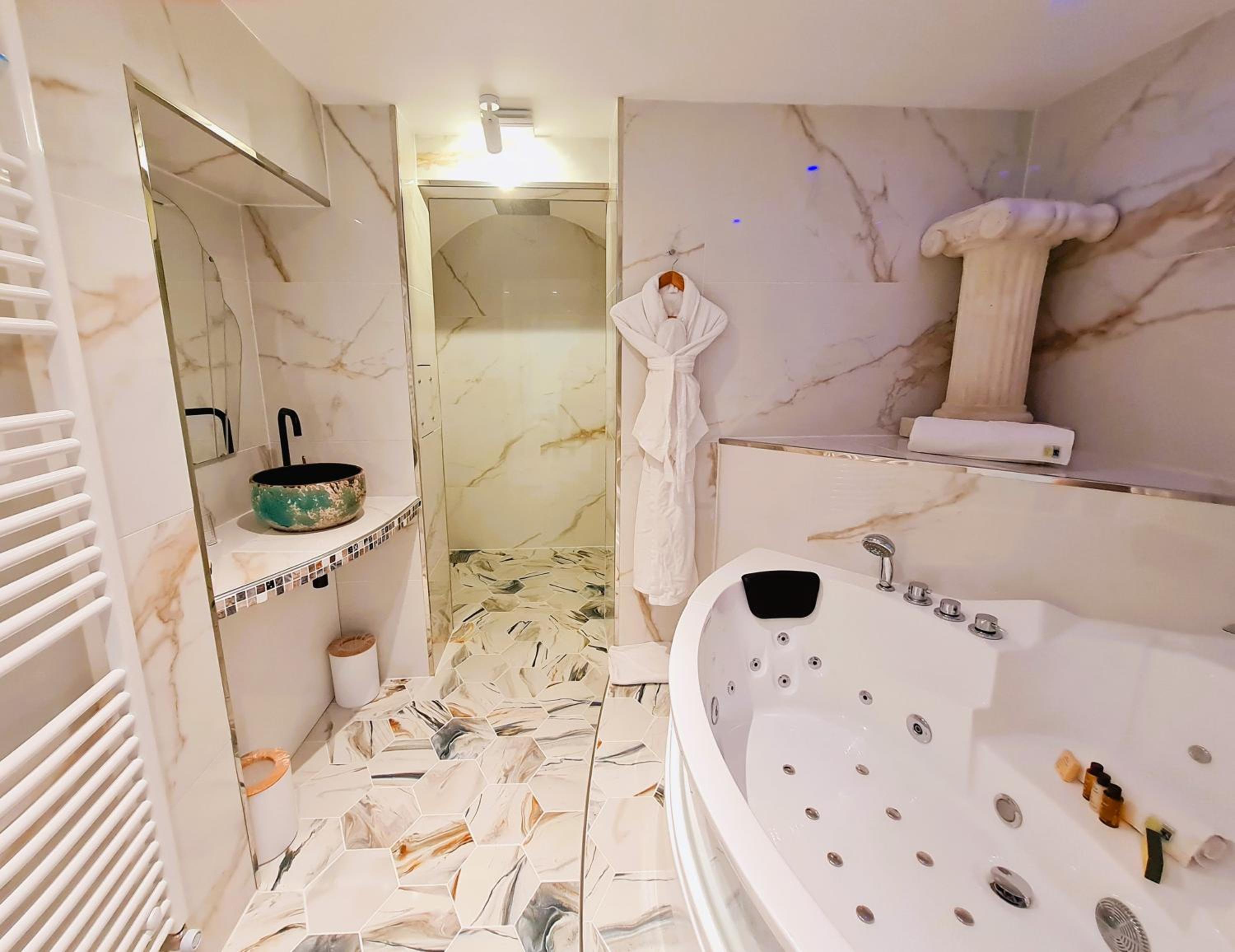 Suite Lit King-Size avec Baignoire Spa Suite Lit King-Size avec Baignoire Spa