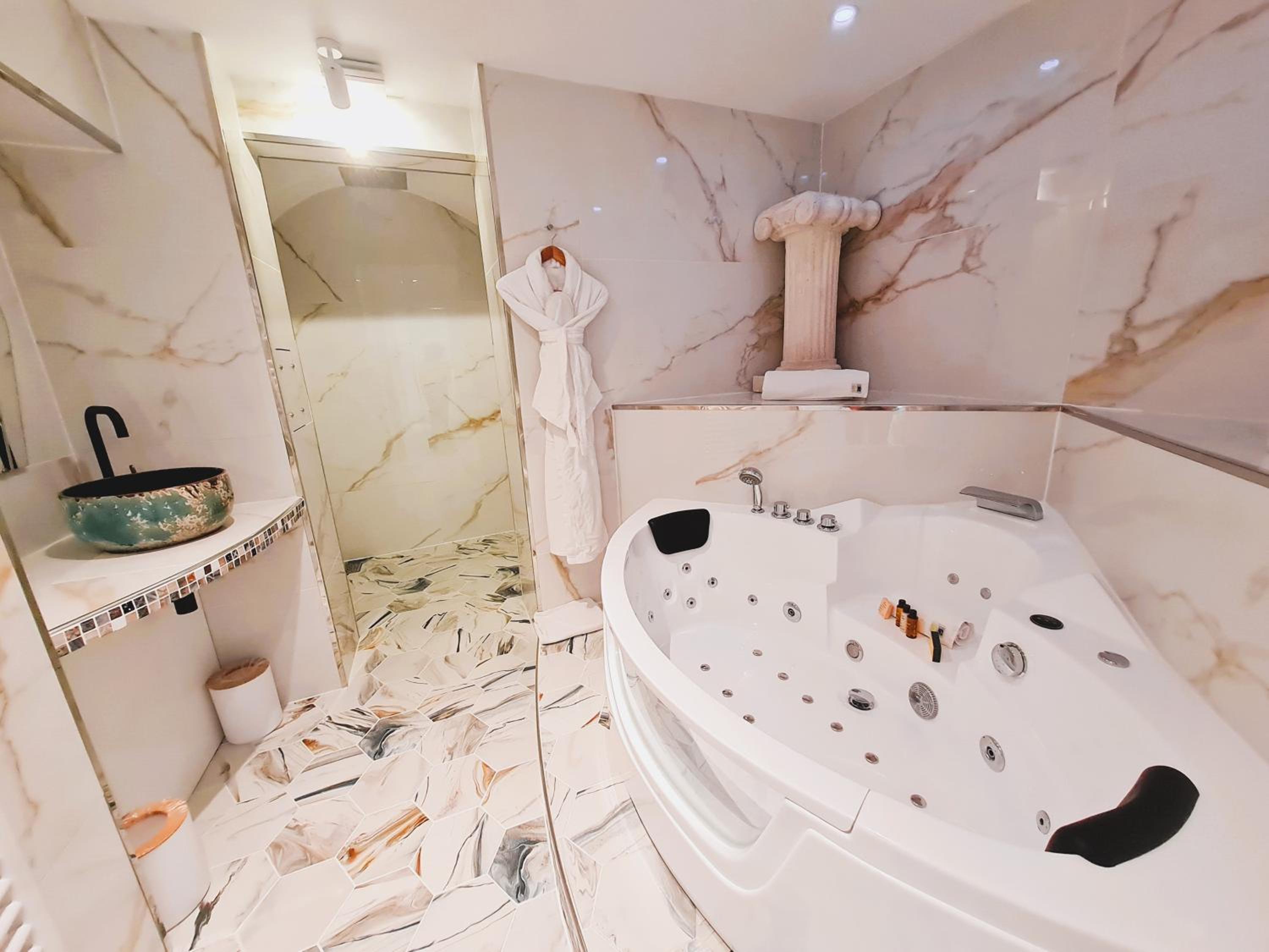 Suite Lit King-Size avec Baignoire Spa Suite Lit King-Size avec Baignoire Spa