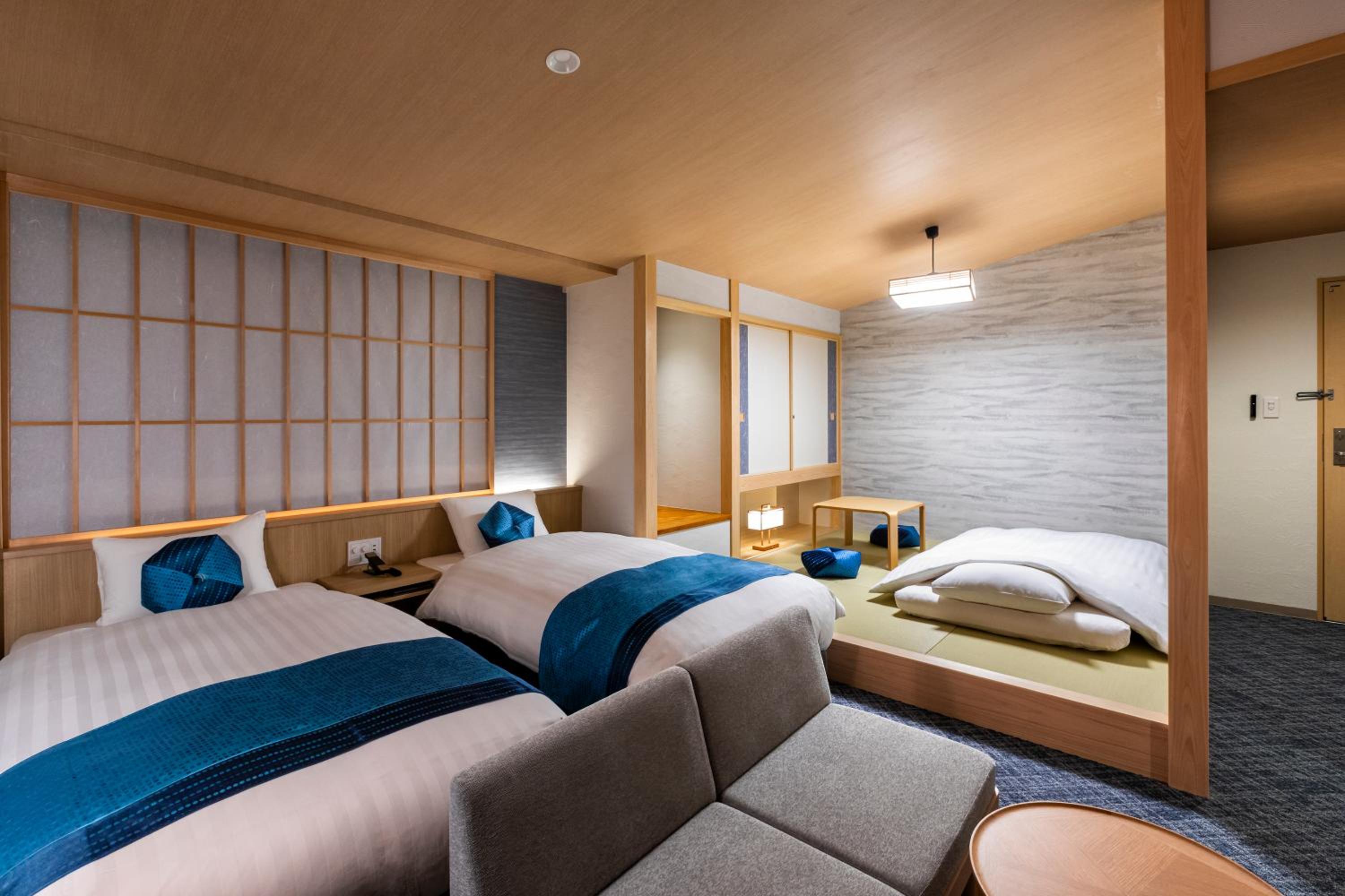 Deluxe Twin Room - Photo 11