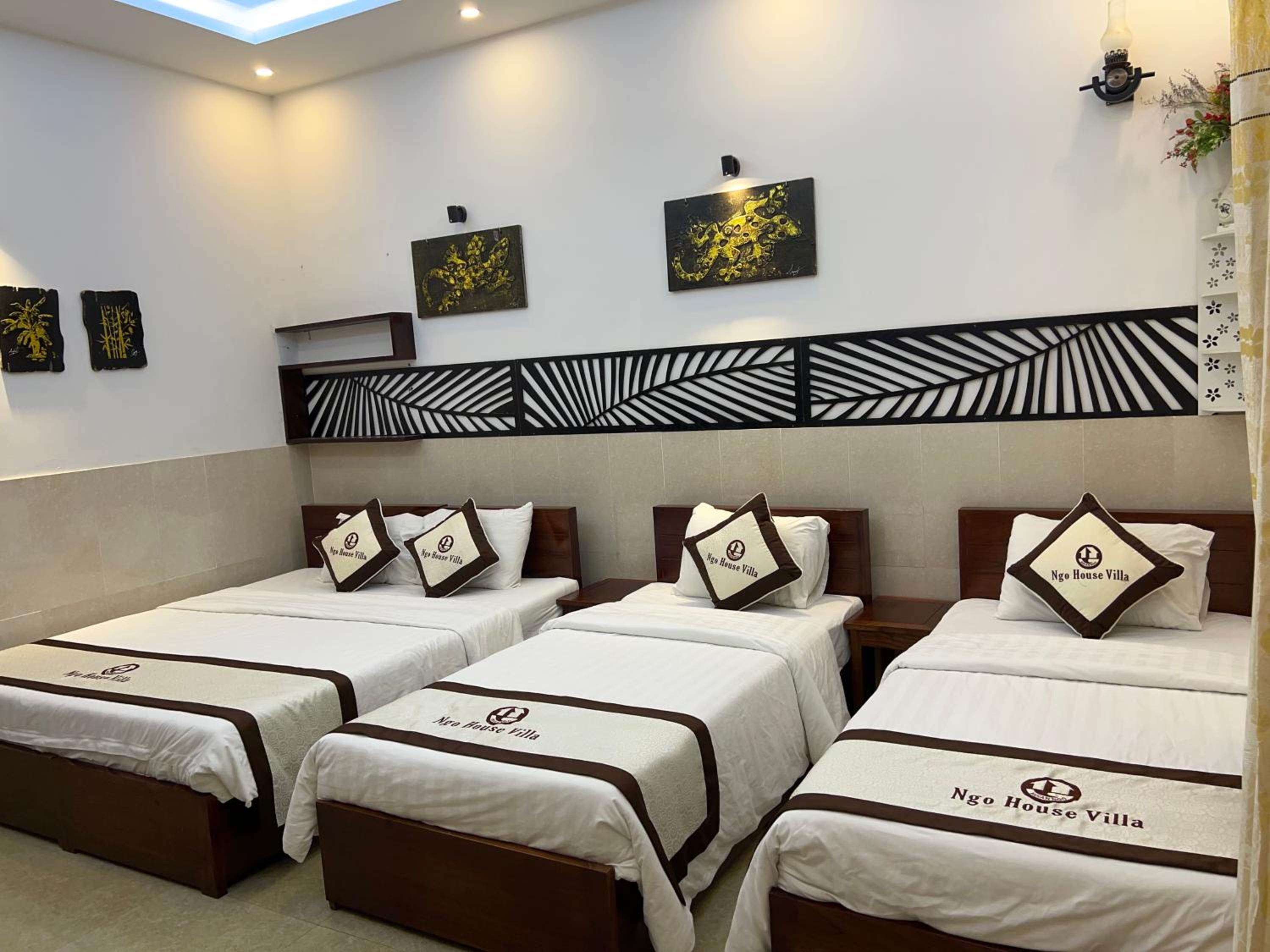 Deluxe Triple Room - Photo 7
