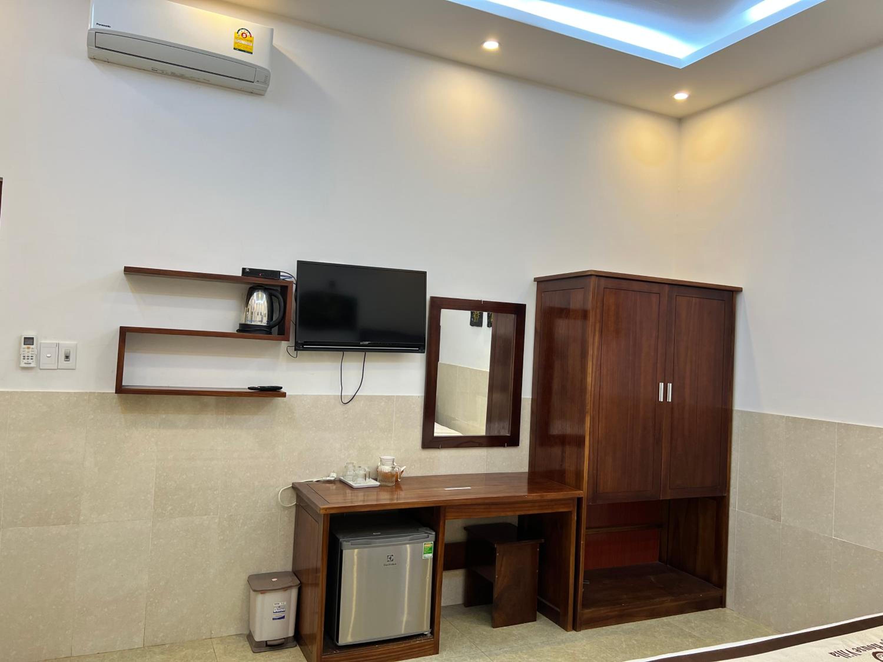 Deluxe Triple Room - Photo 11