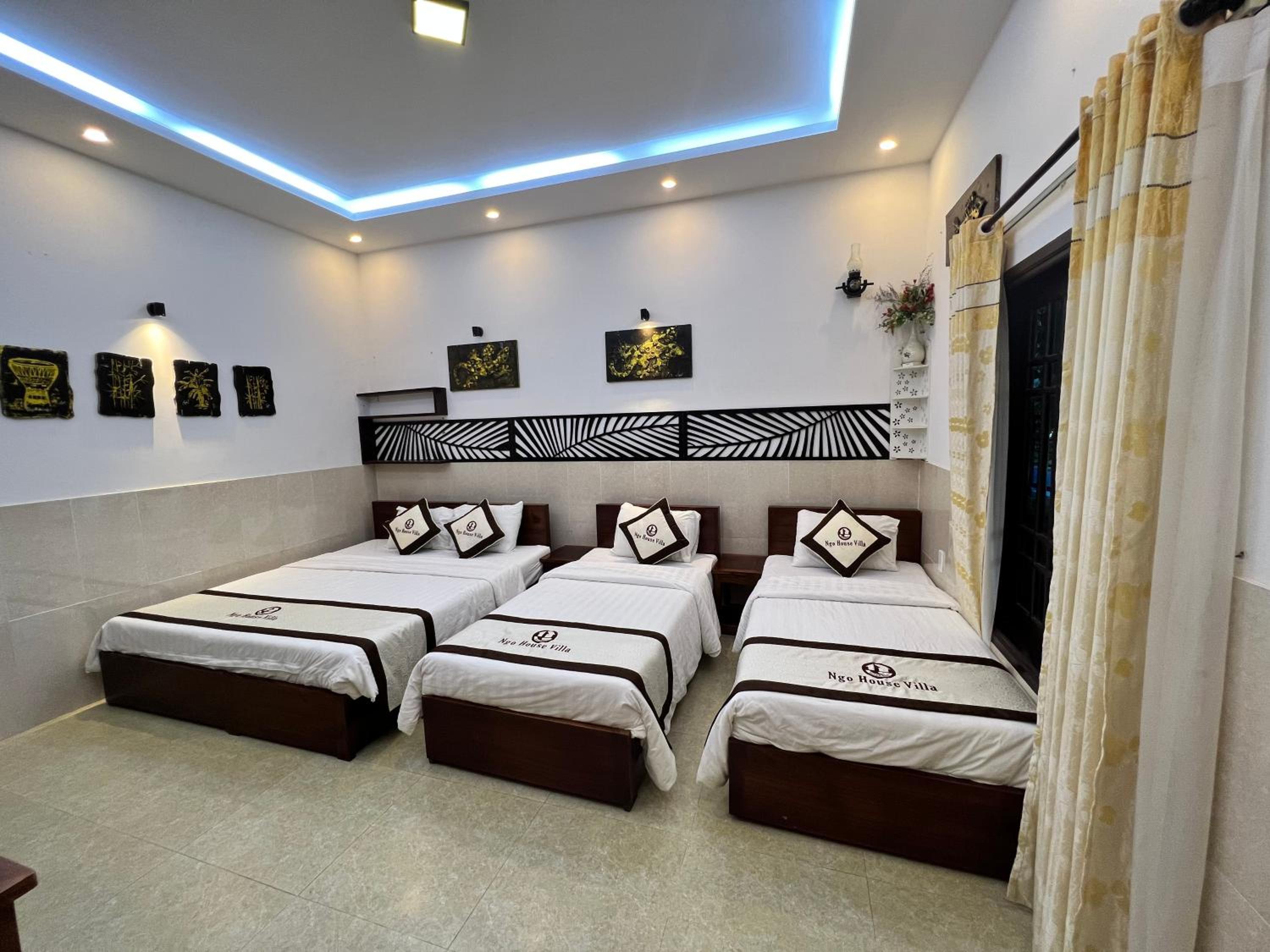 Deluxe Triple Room - Photo 10