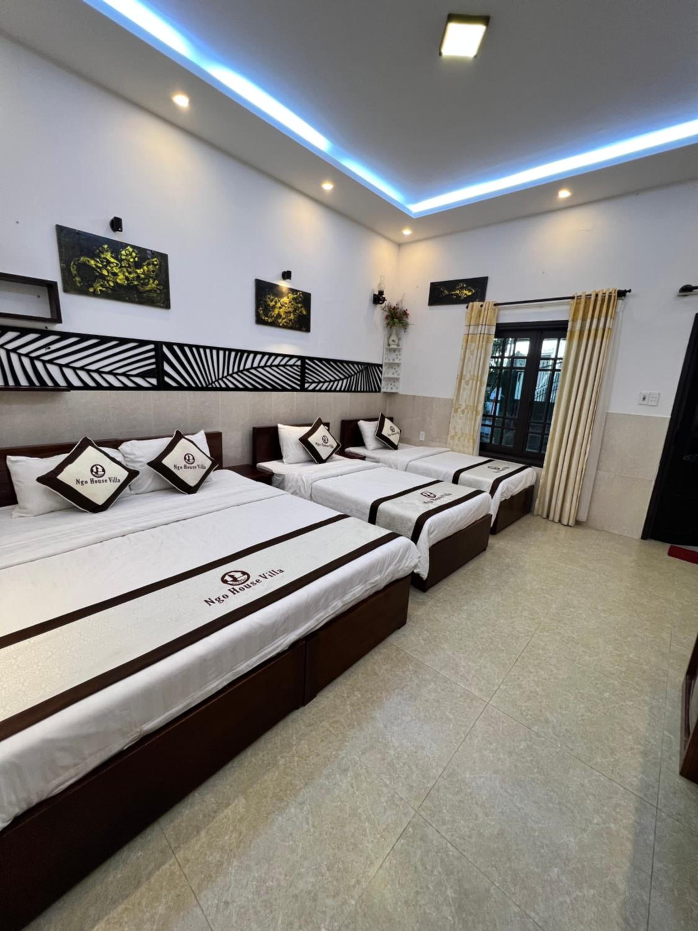 Deluxe Triple Room - Photo 8