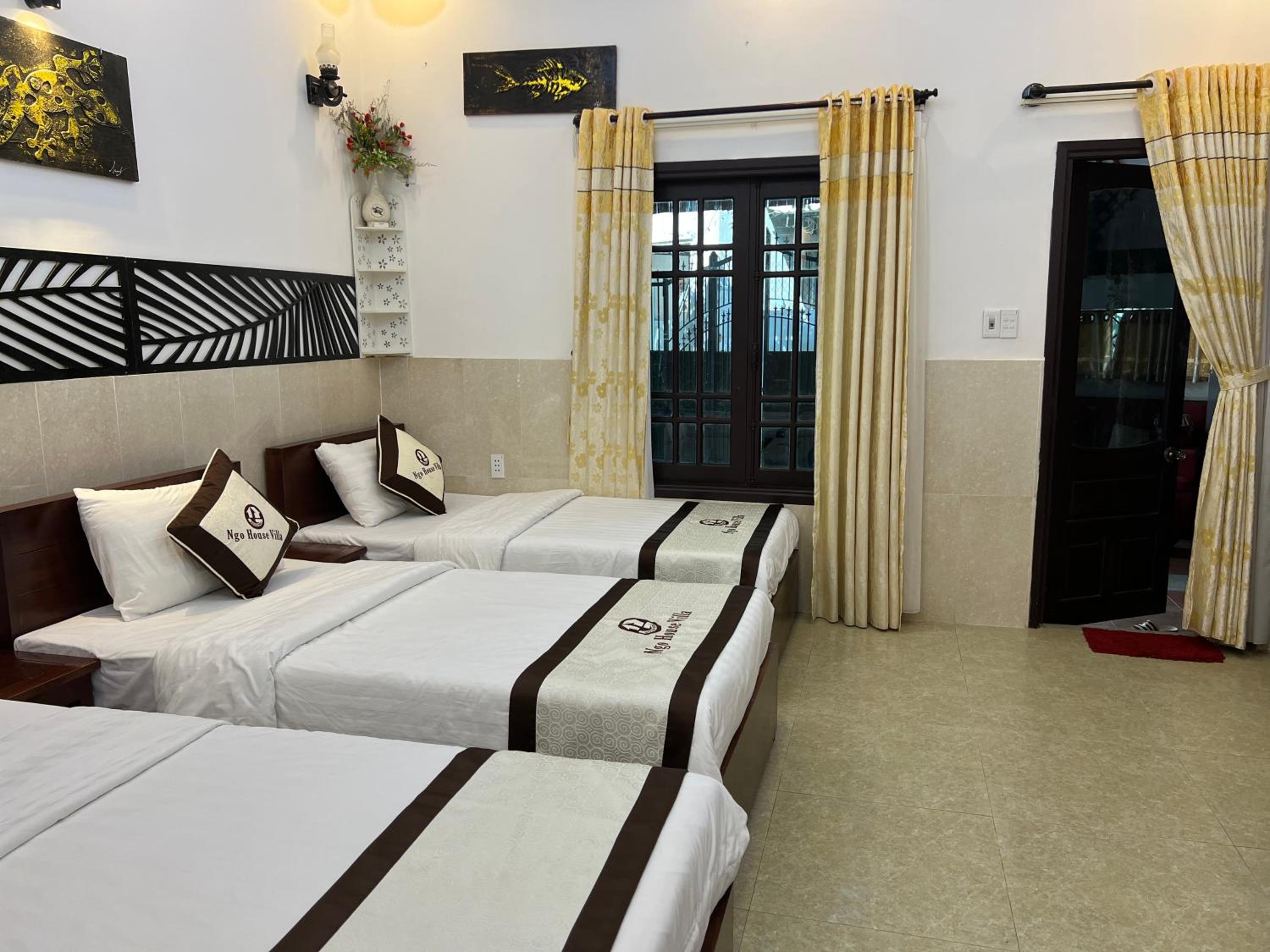 Deluxe Triple Room - Photo 9