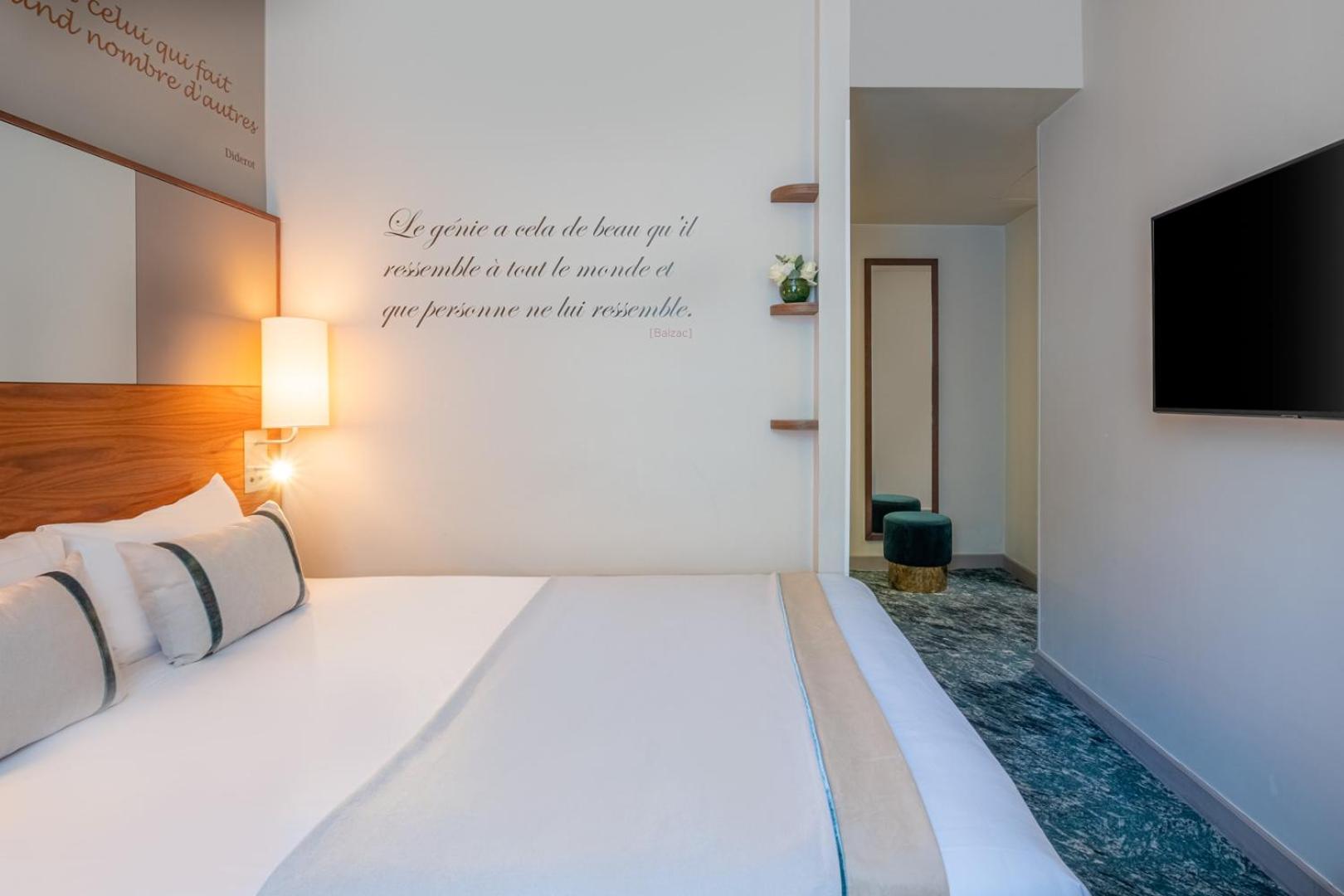 Hôtel Le Tourville by Inwood Hotels bedroom photo