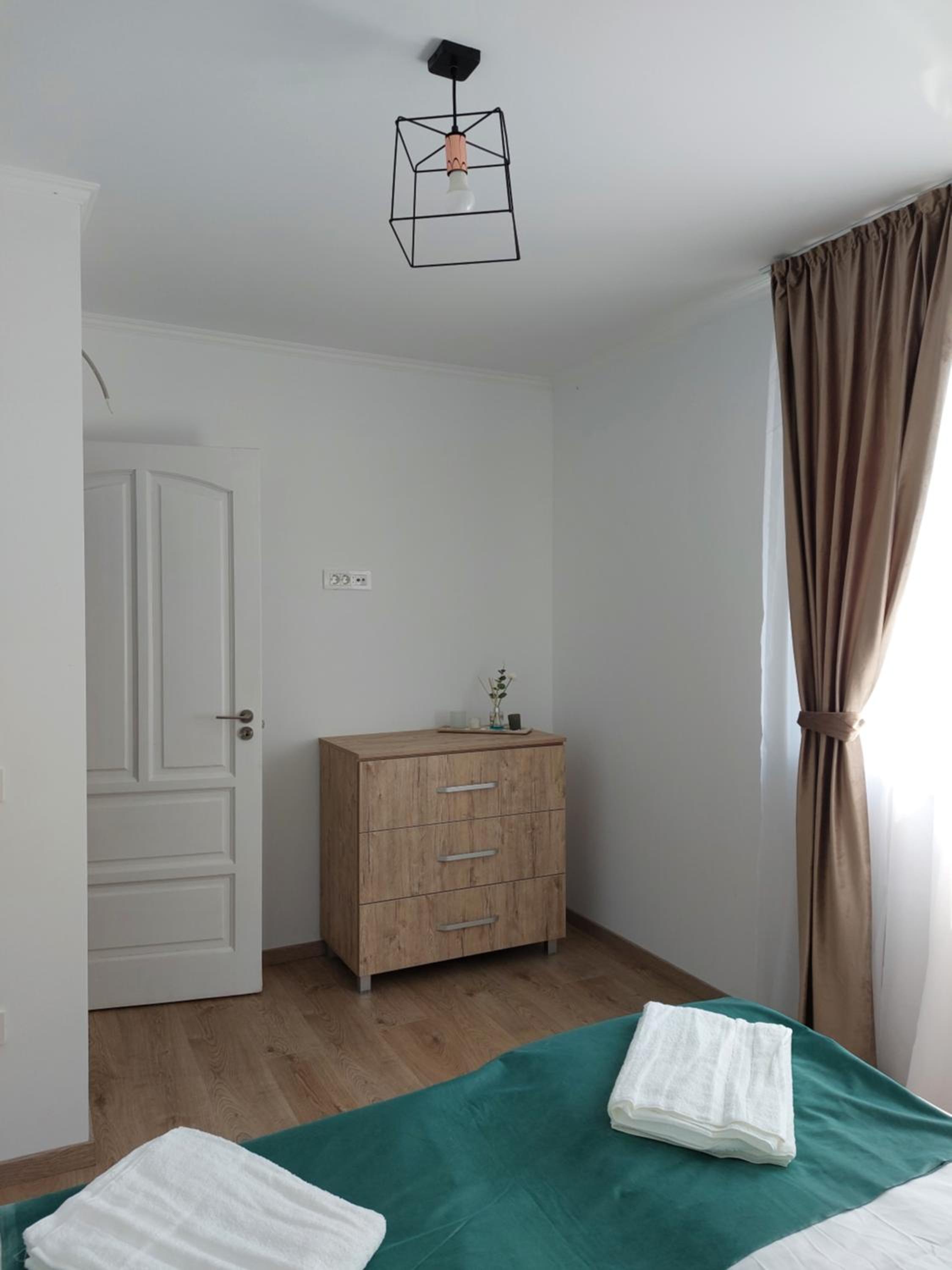 Three-Bedroom Apartment - Photo 20