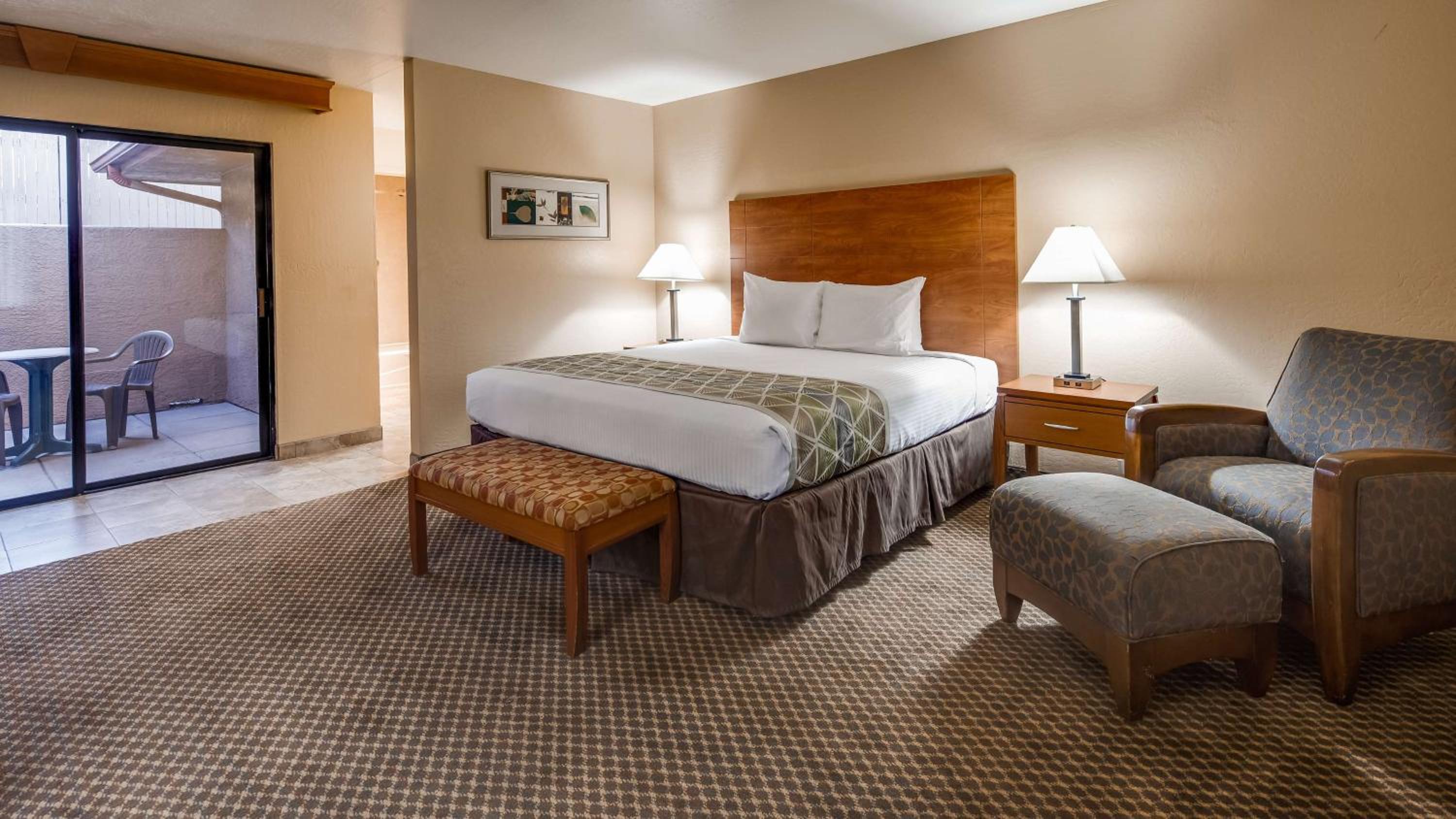 King Suite with Bath Tub and Private Patio - Disability/Non-Smoking photo 1
