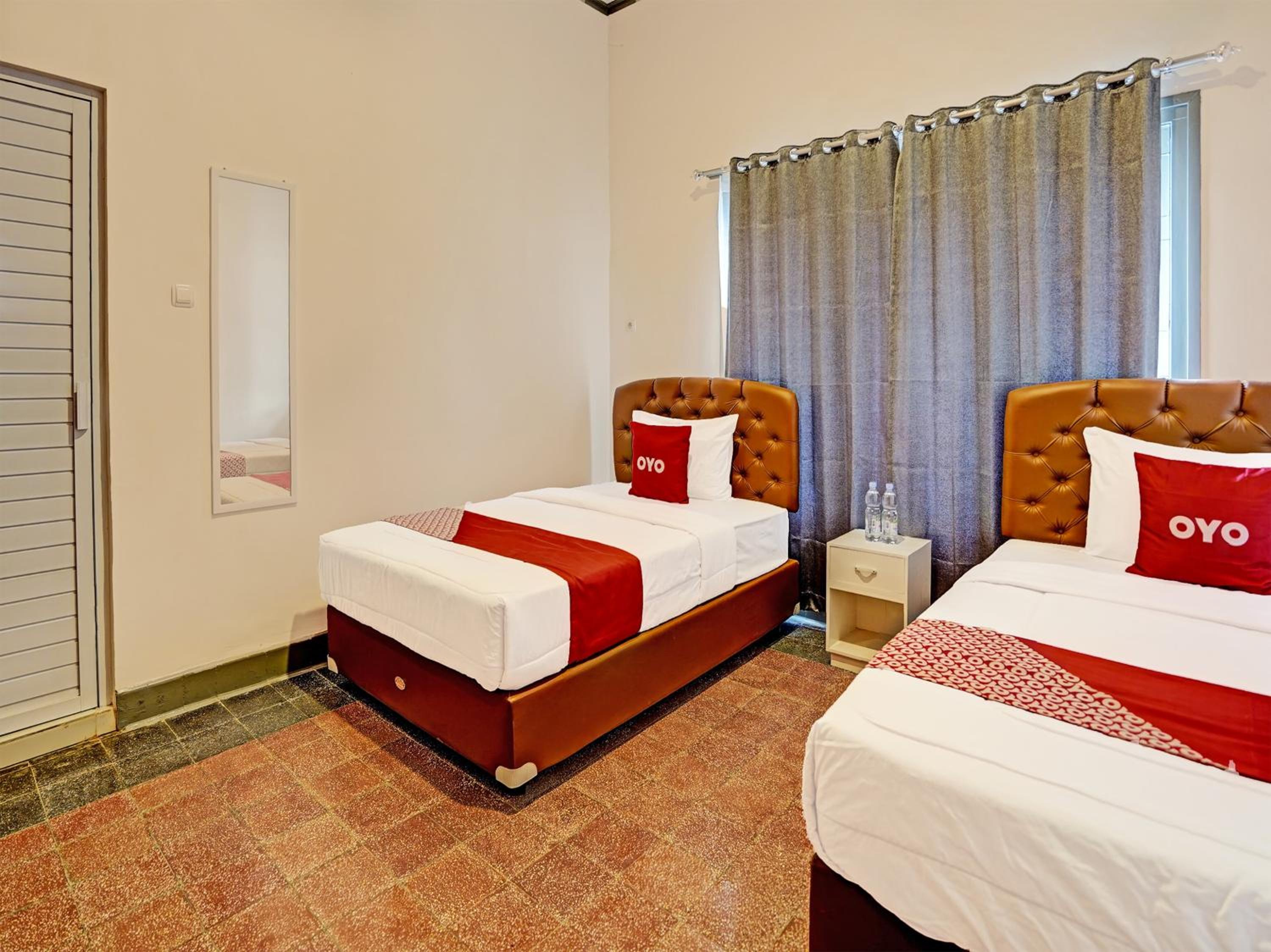 Delxue Twin Room - Photo 1