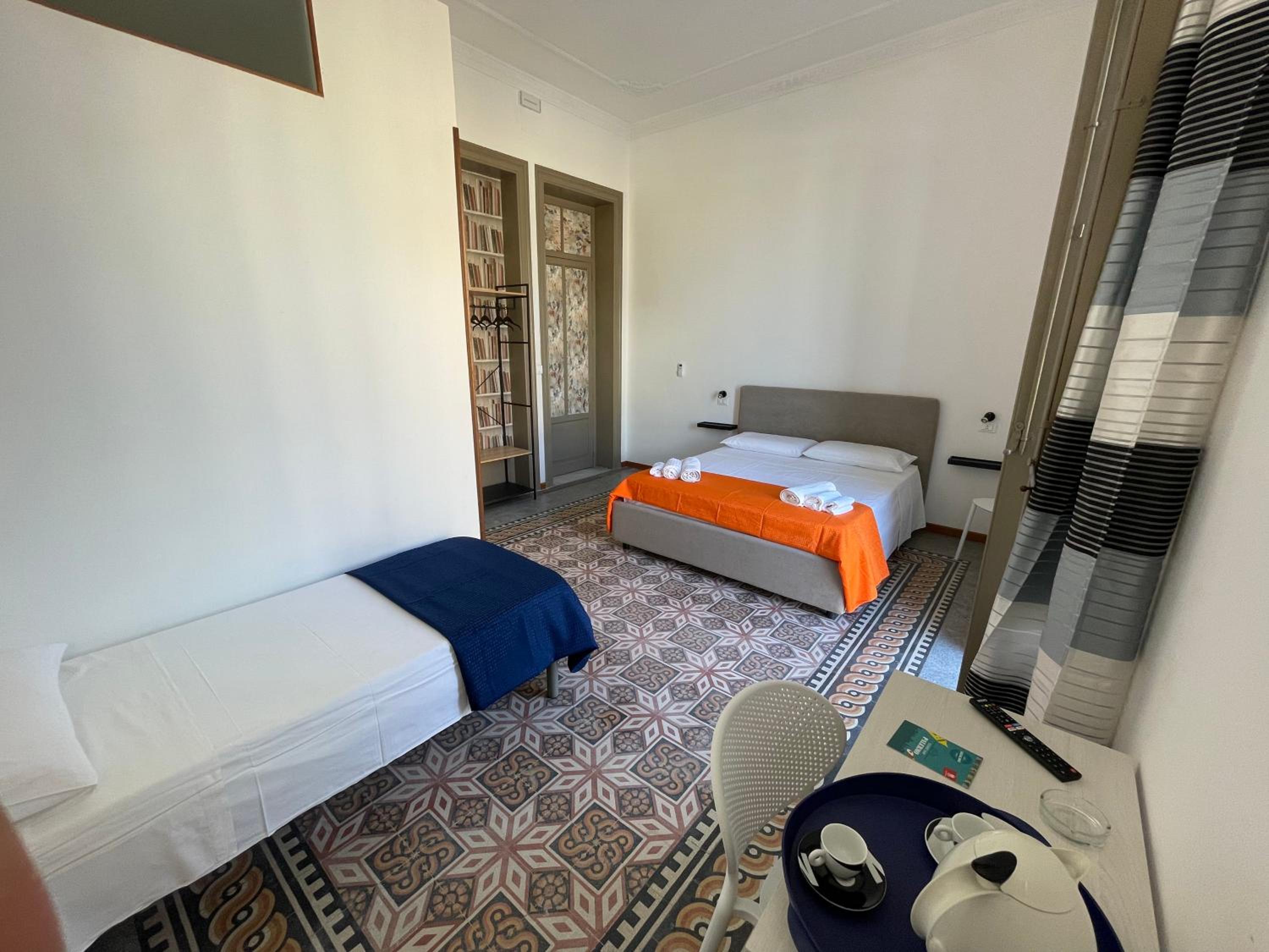 Quadruple Room with Private Bathroom - Photo 2