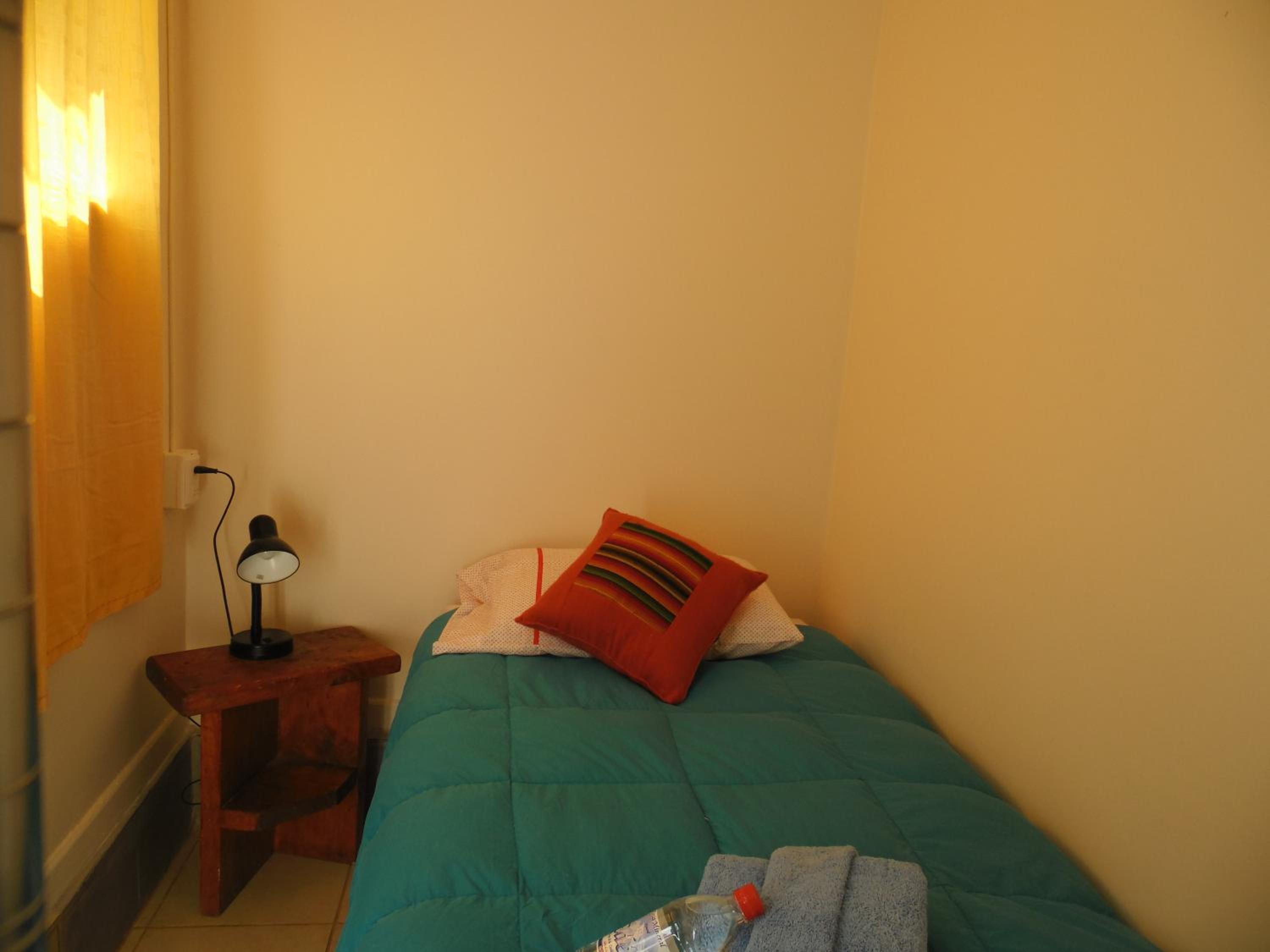 Basic Single Room with Shared Bathroom photo 1