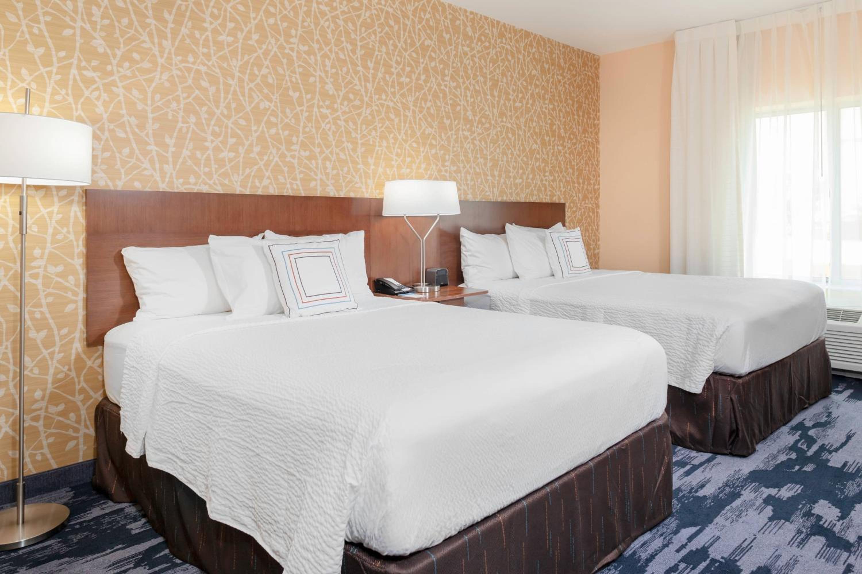 Queen Suite with Two Queen Beds and Sofa Bed