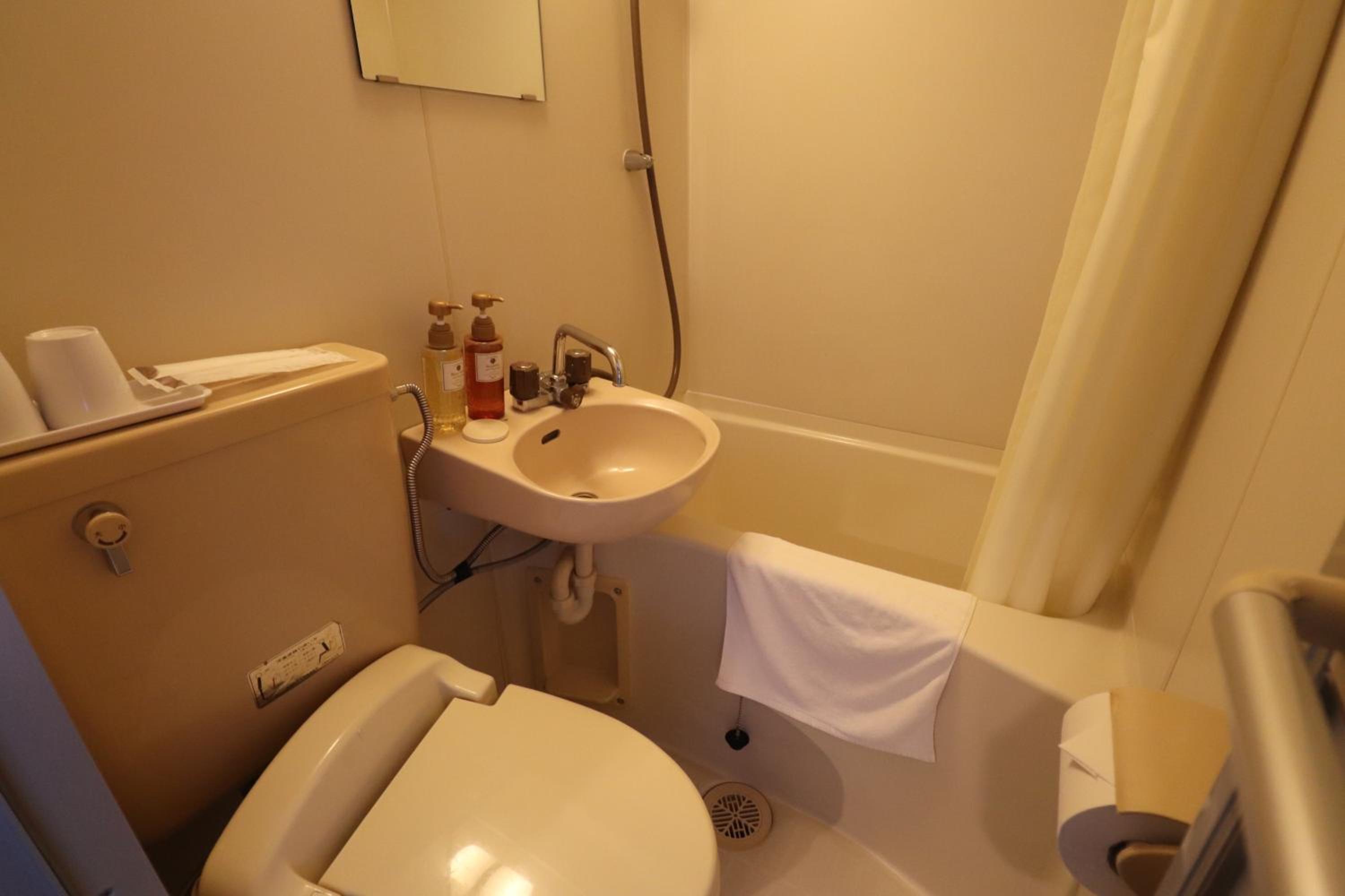 Standard Twin Room - Photo 6