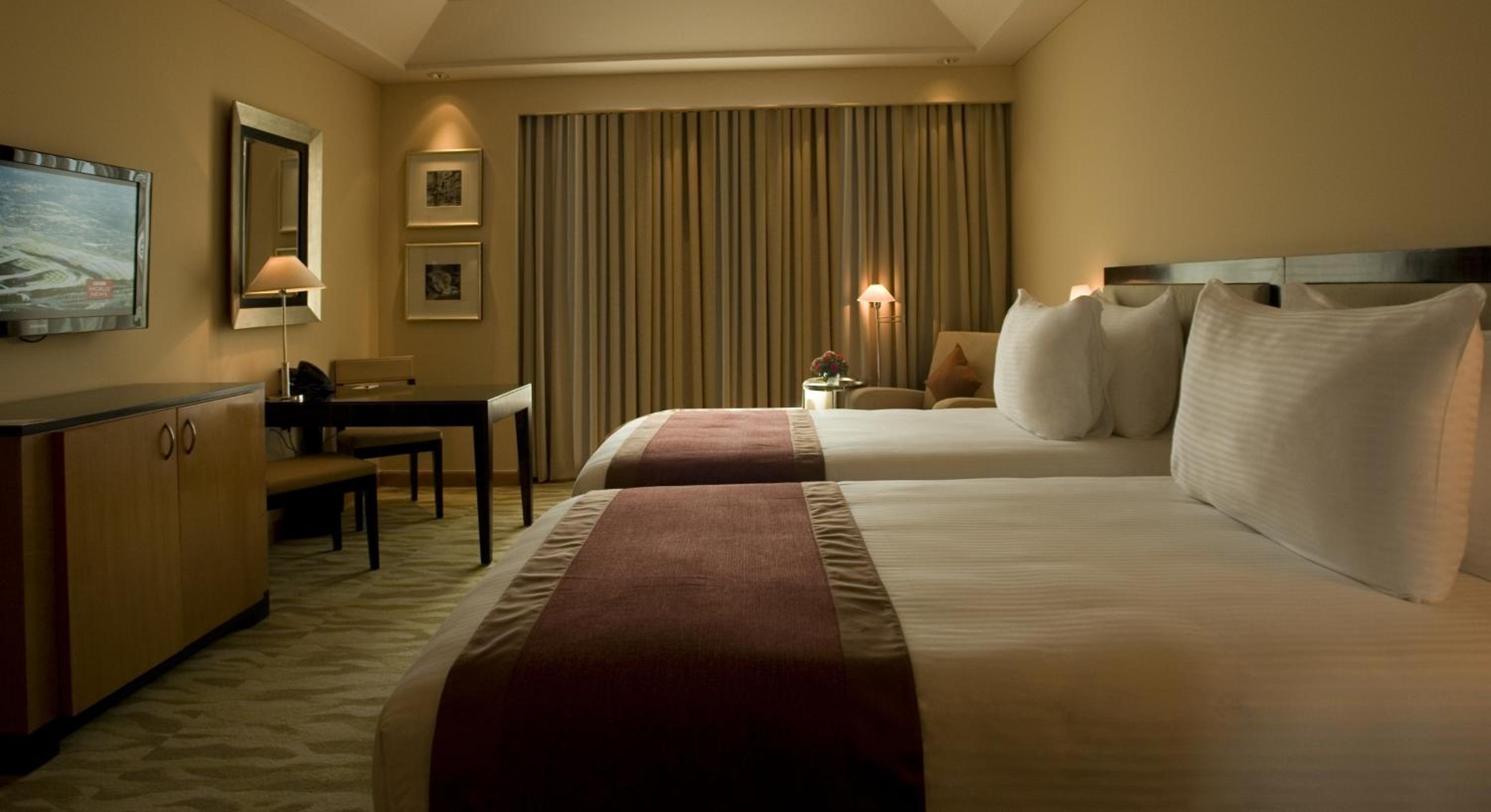 The Grand Deluxe Room with Twin Bed with 20% off on session of 30 mins Spa,15% off on food & soft beverage services,20% Discount on Laundry service Per stay per room - Photo 3