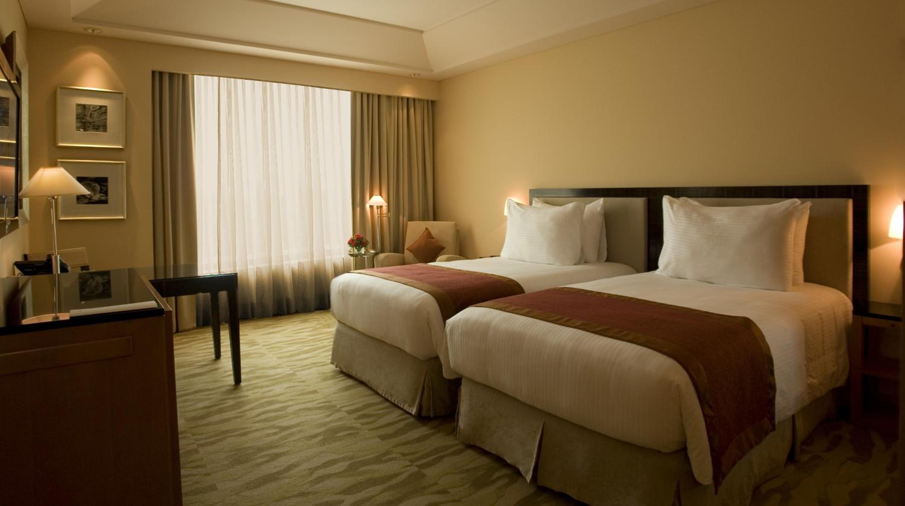 The Grand Deluxe Room with Twin Bed with 20% off on session of 30 mins Spa,15% off on food & soft beverage services,20% Discount on Laundry service Per stay per room - Photo 2