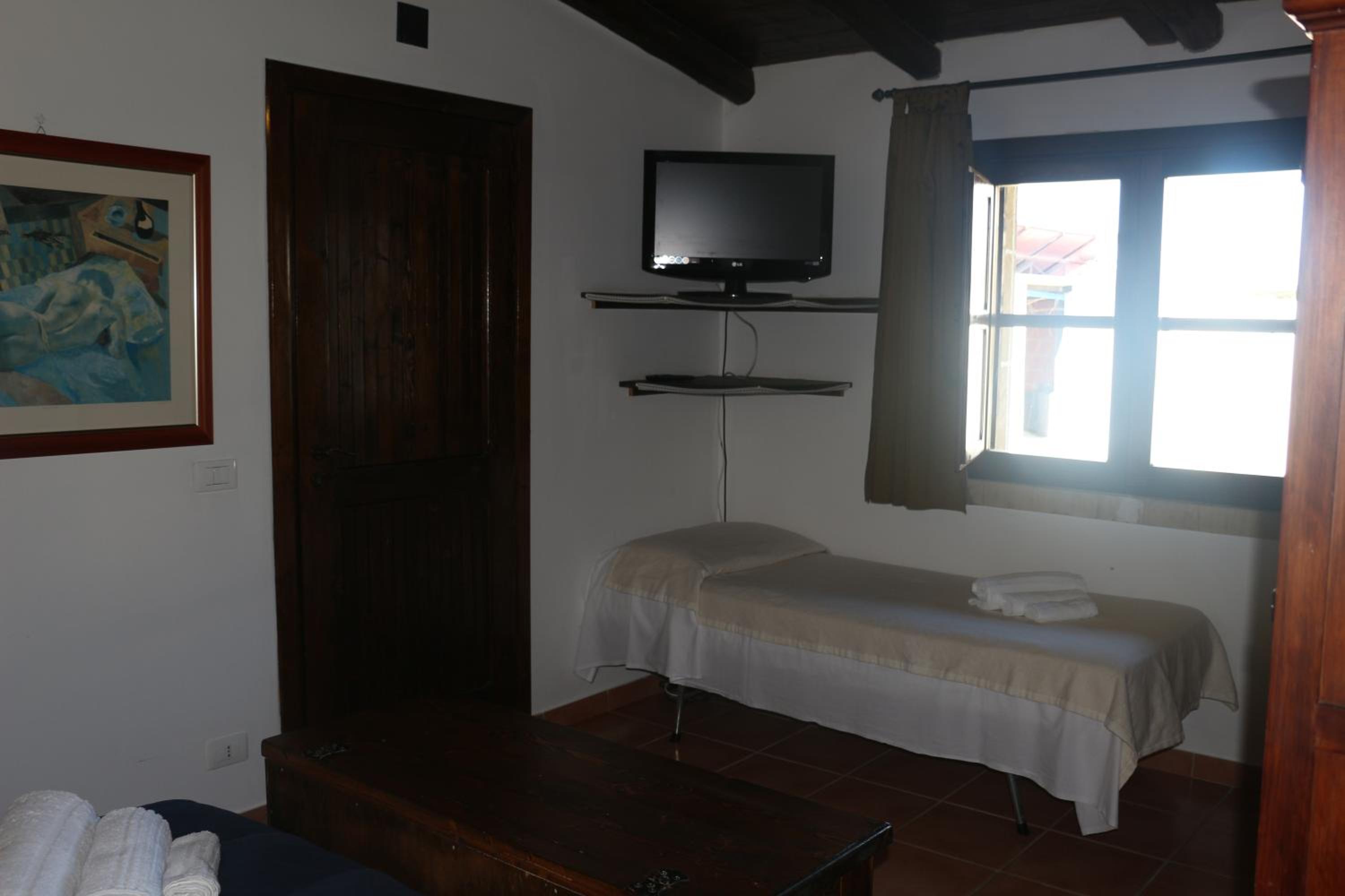 Quadruple Room - Photo 7