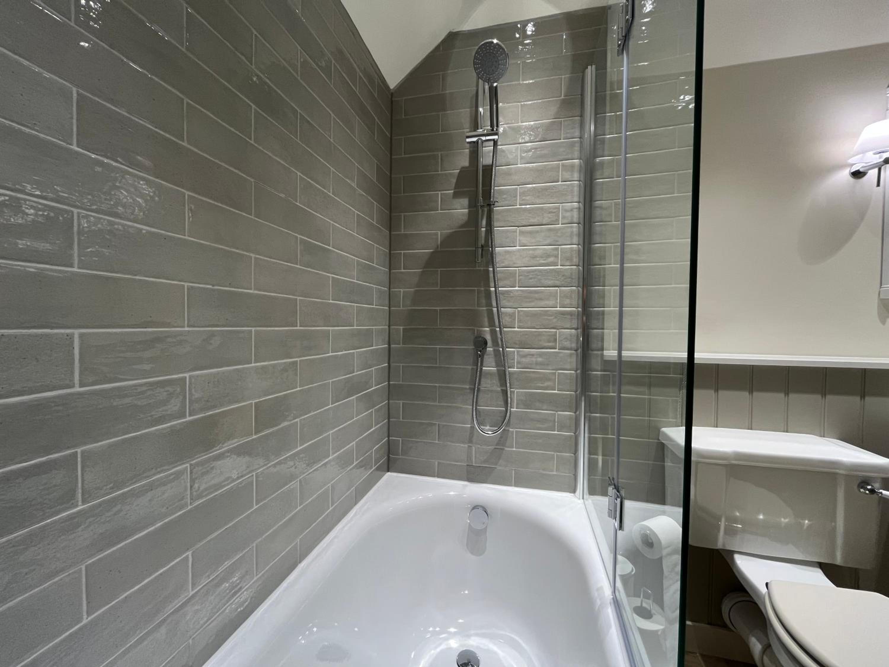 Three-Bedroom House - Photo 23