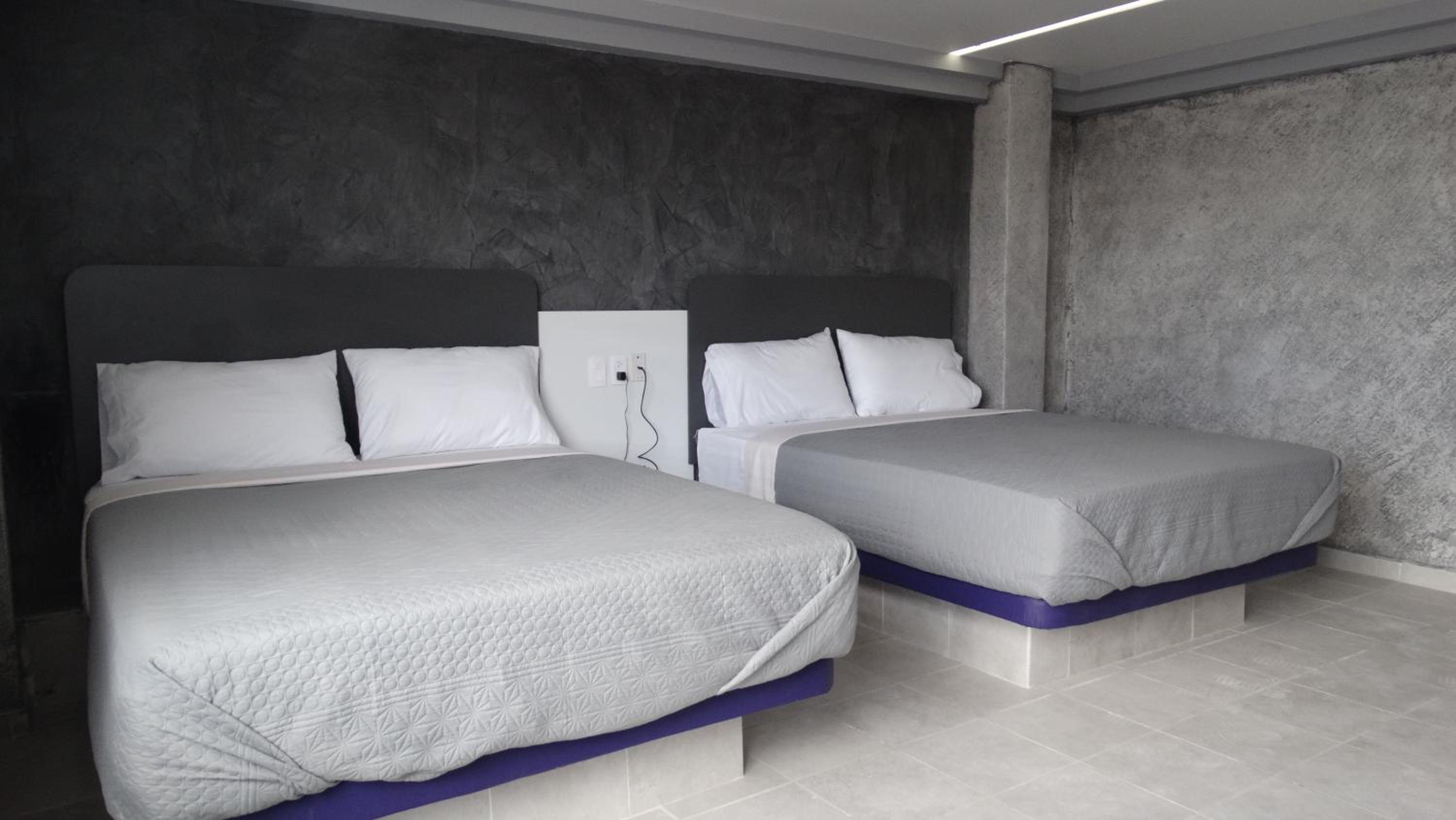Deluxe Queen Room with Two Queen Beds - Photo 3