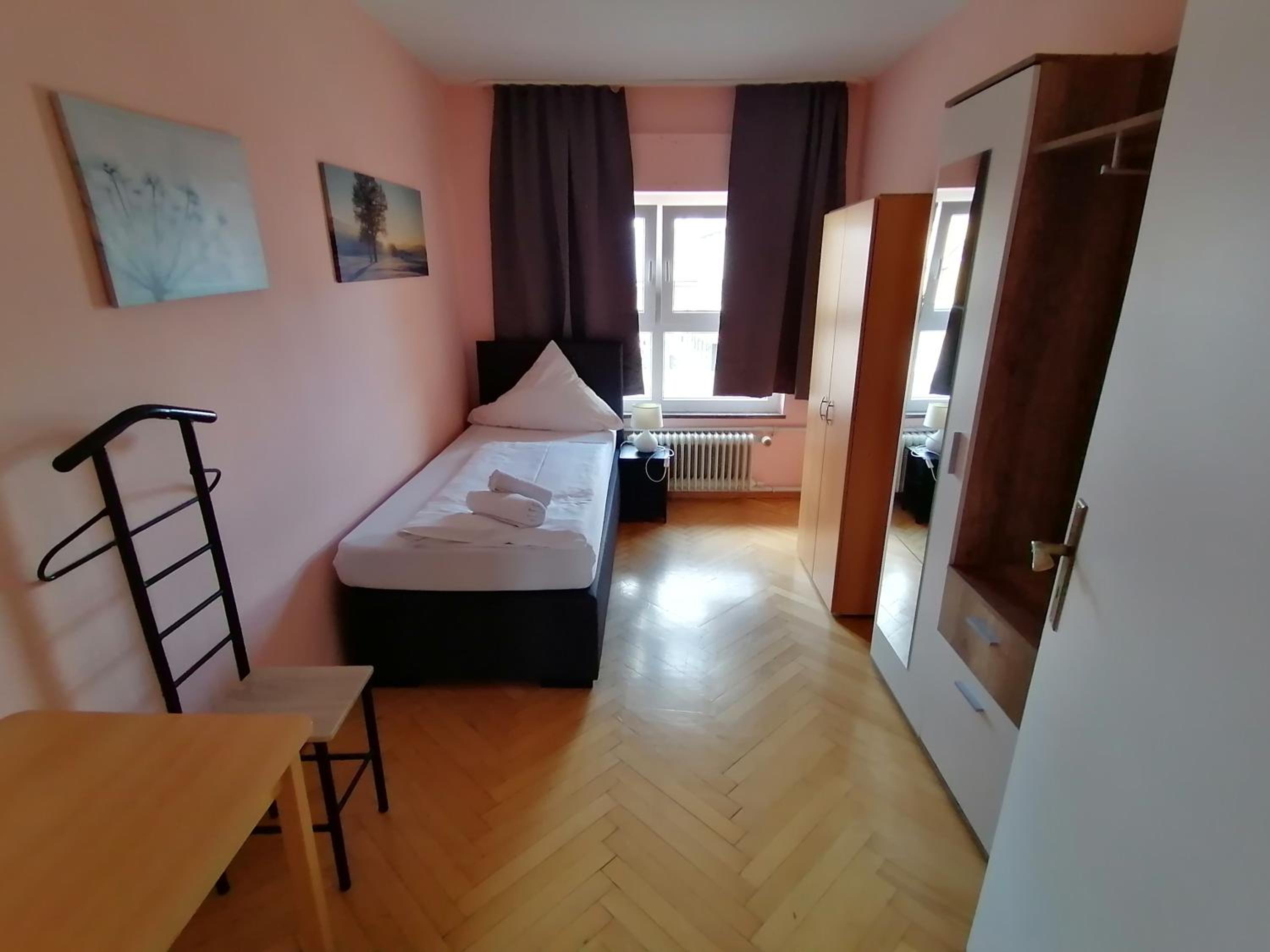 Three-Bedroom Apartment - Photo 2