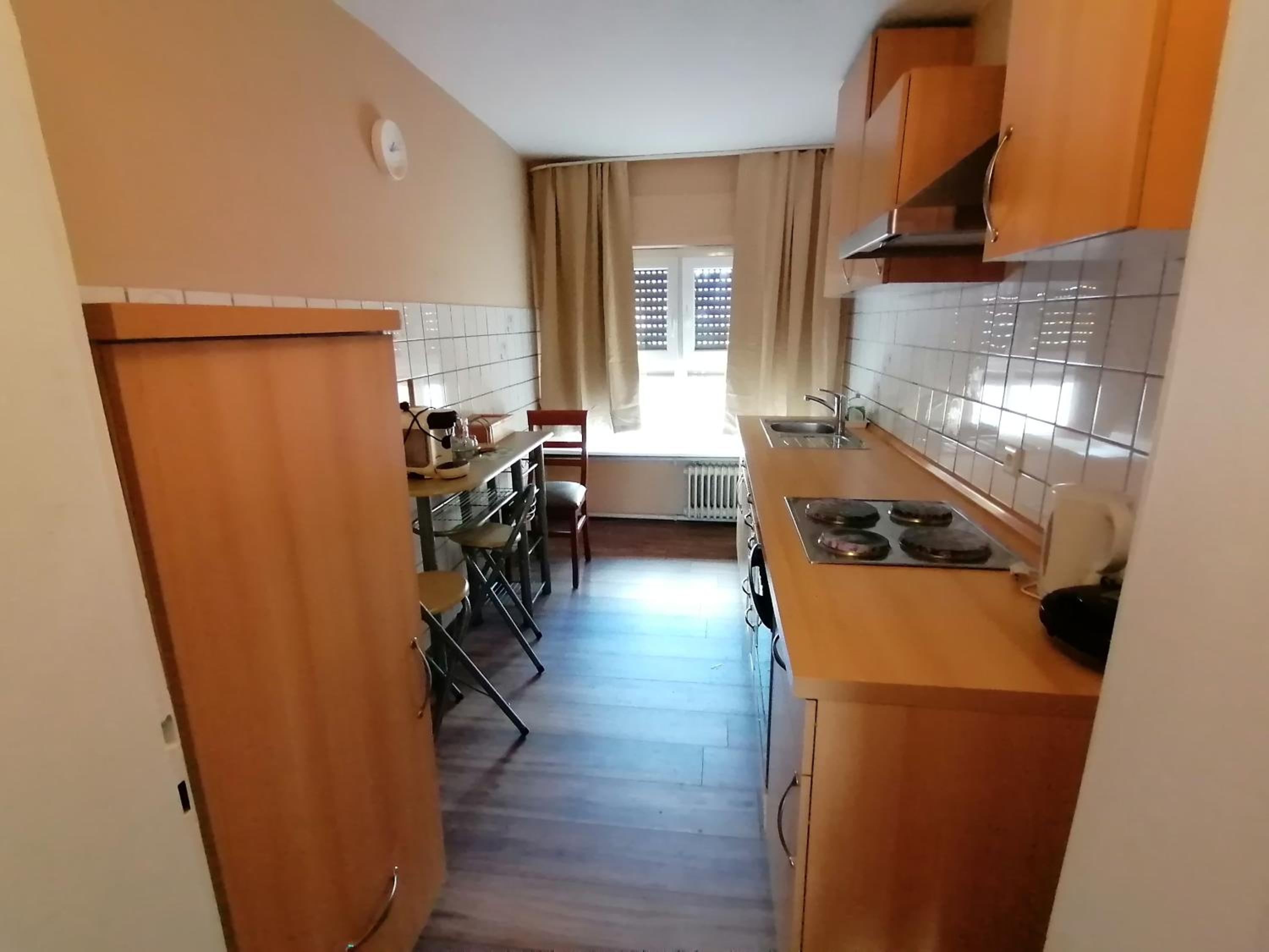 Three-Bedroom Apartment - Photo 4