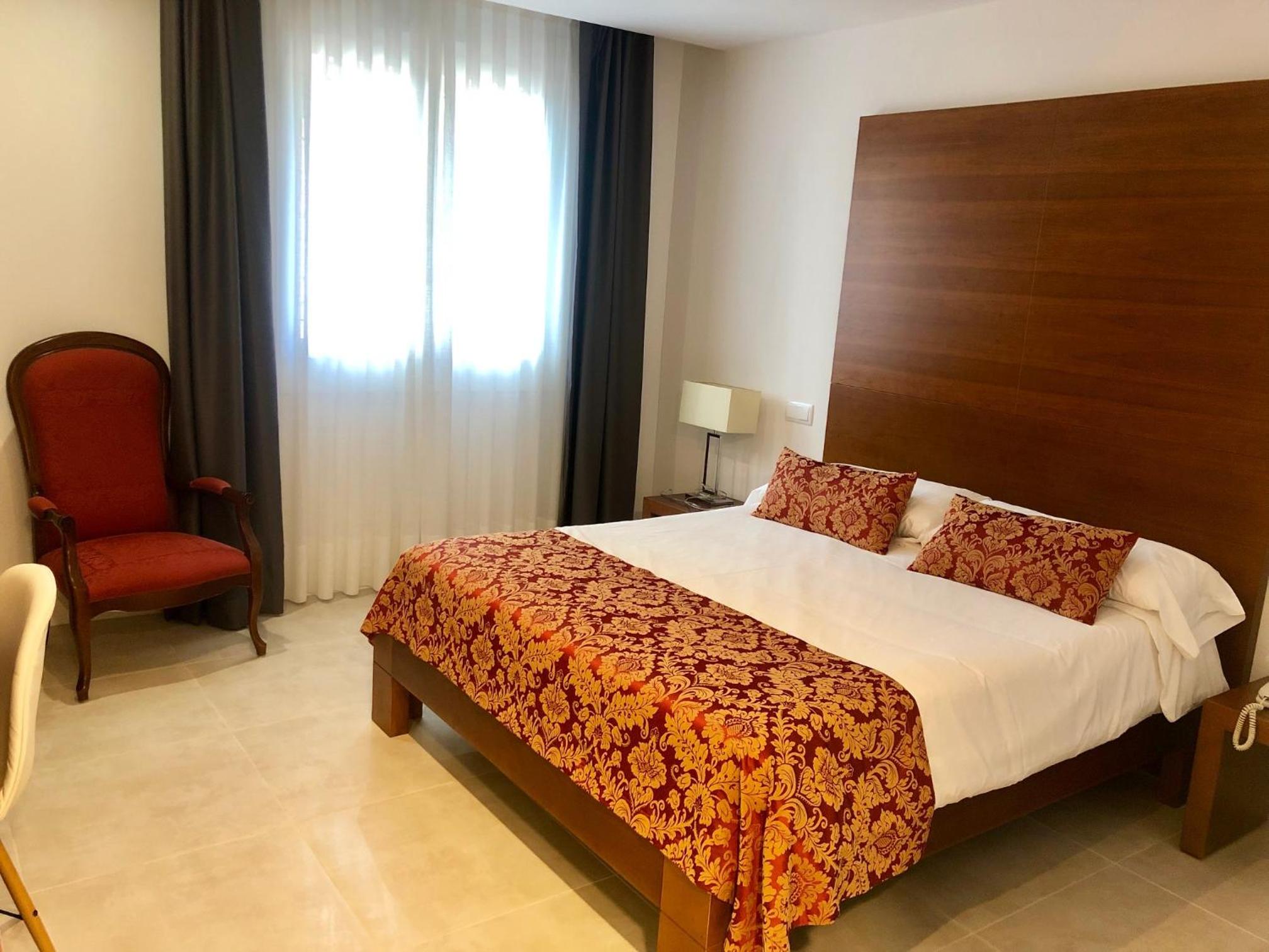 Habitación Estándar con Cama Queen