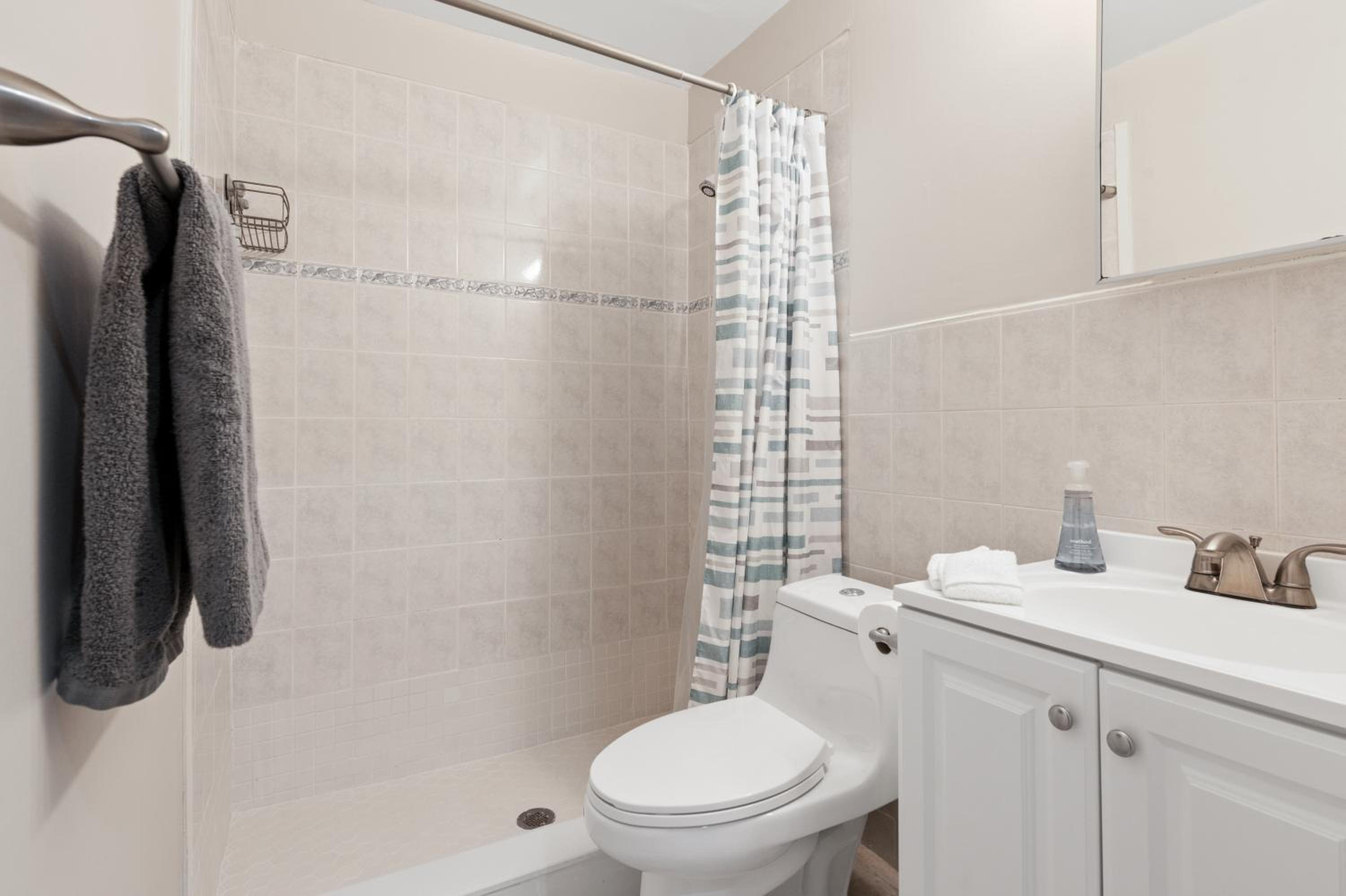 Three-Bedroom House - Photo 23