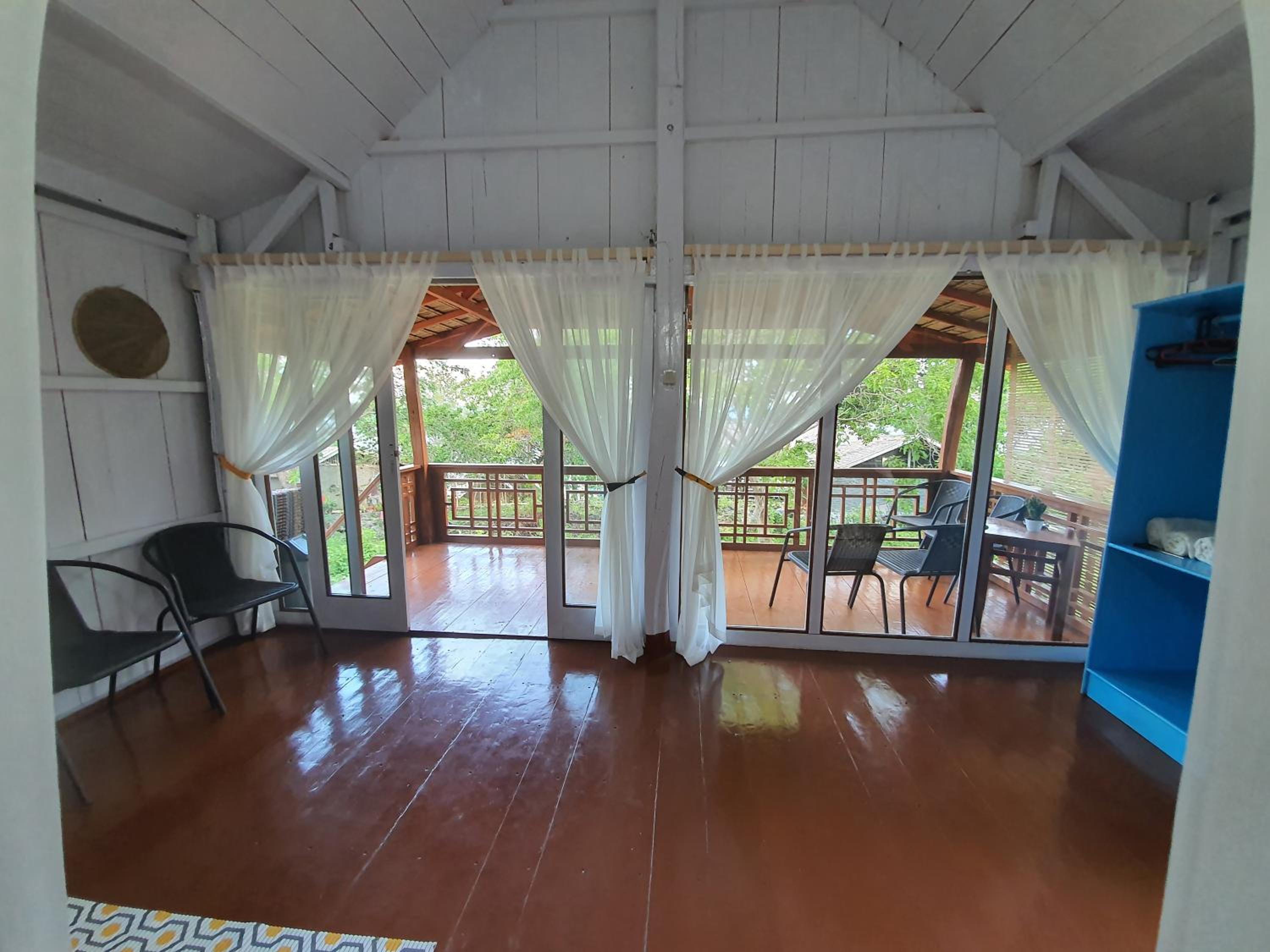 Family Room with Balcony - Photo 4