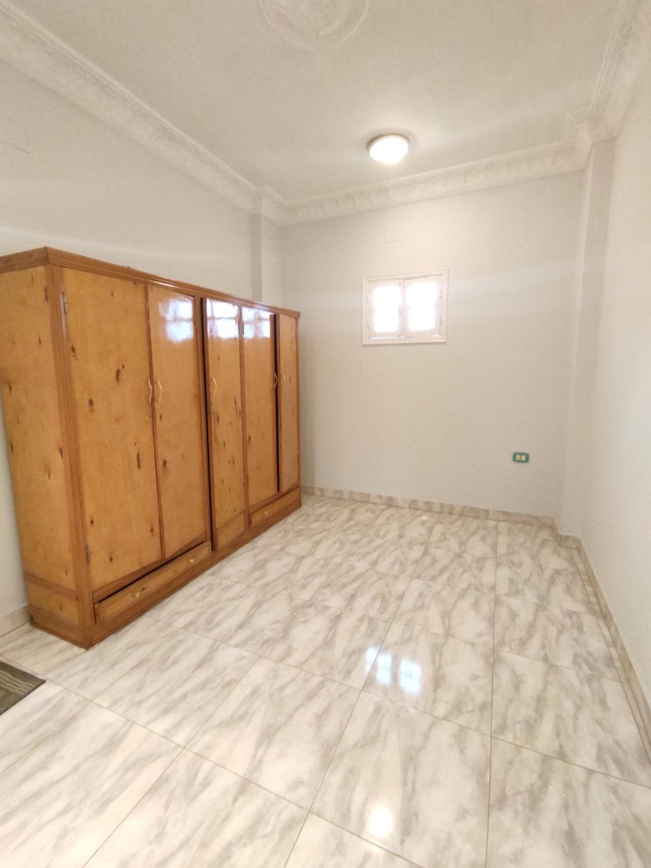 Two-Bedroom Apartment - Photo 11