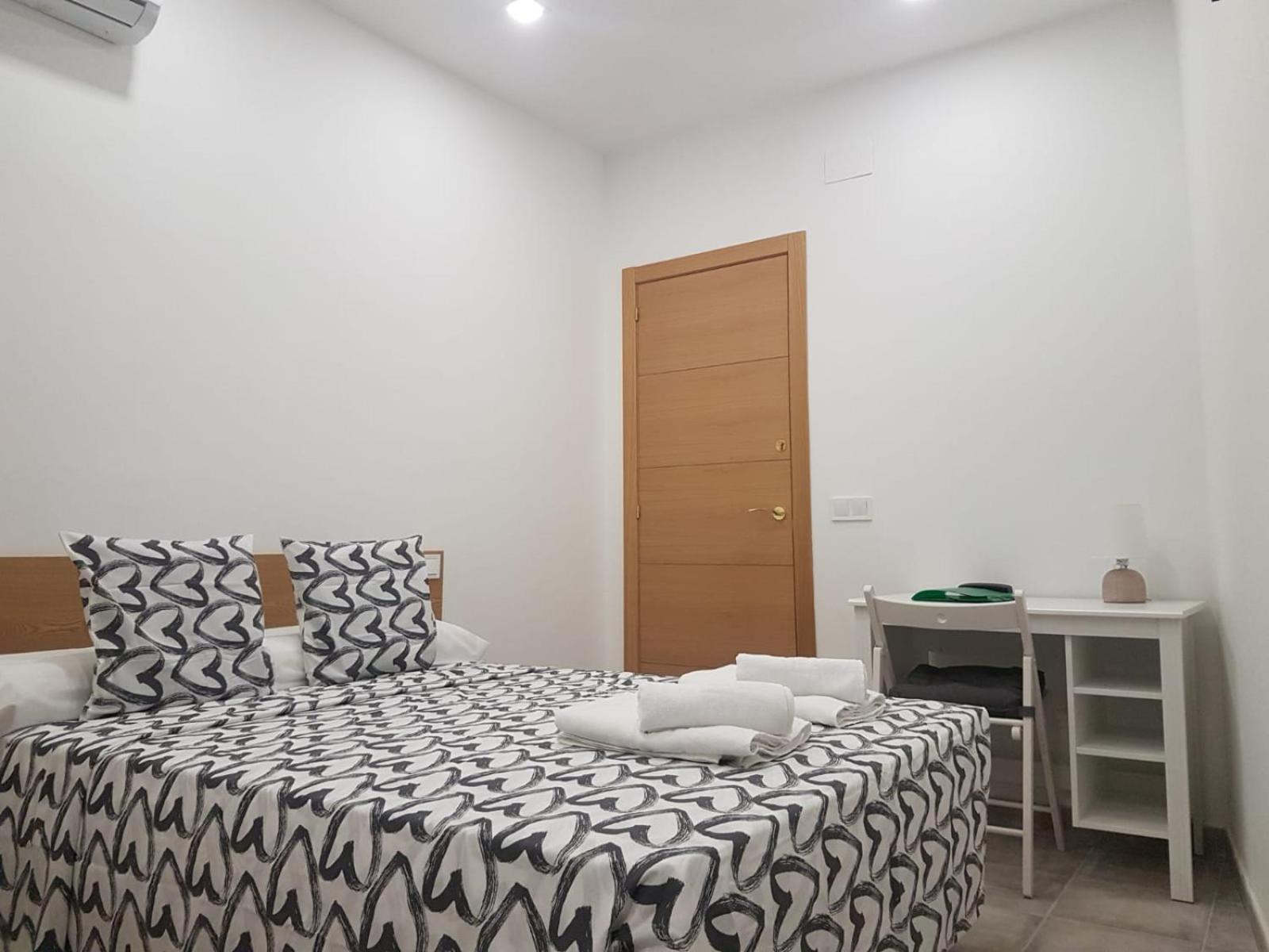 Habitación doble con baño compartido
