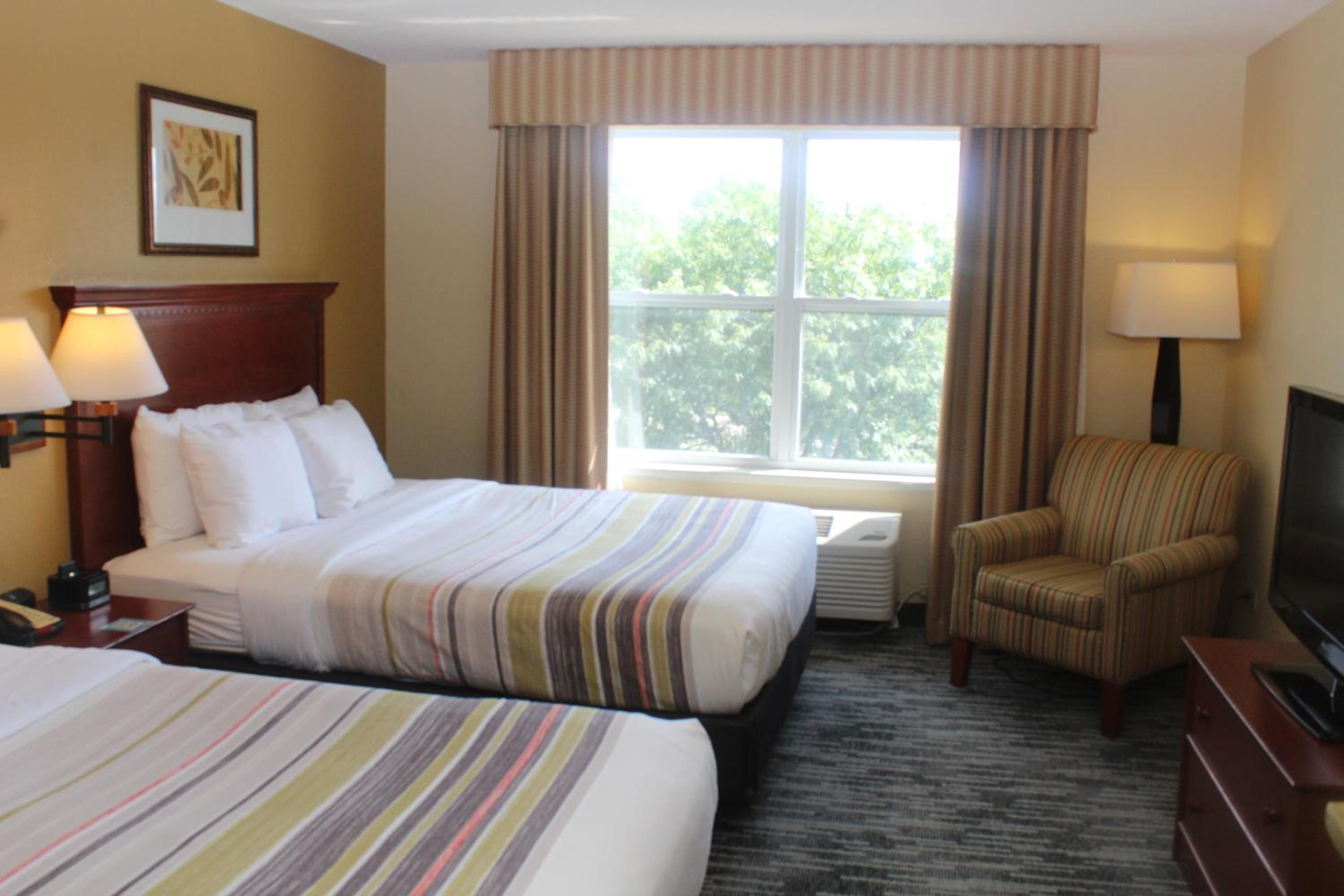 Queen Room with Two Queen Beds - Photo 1