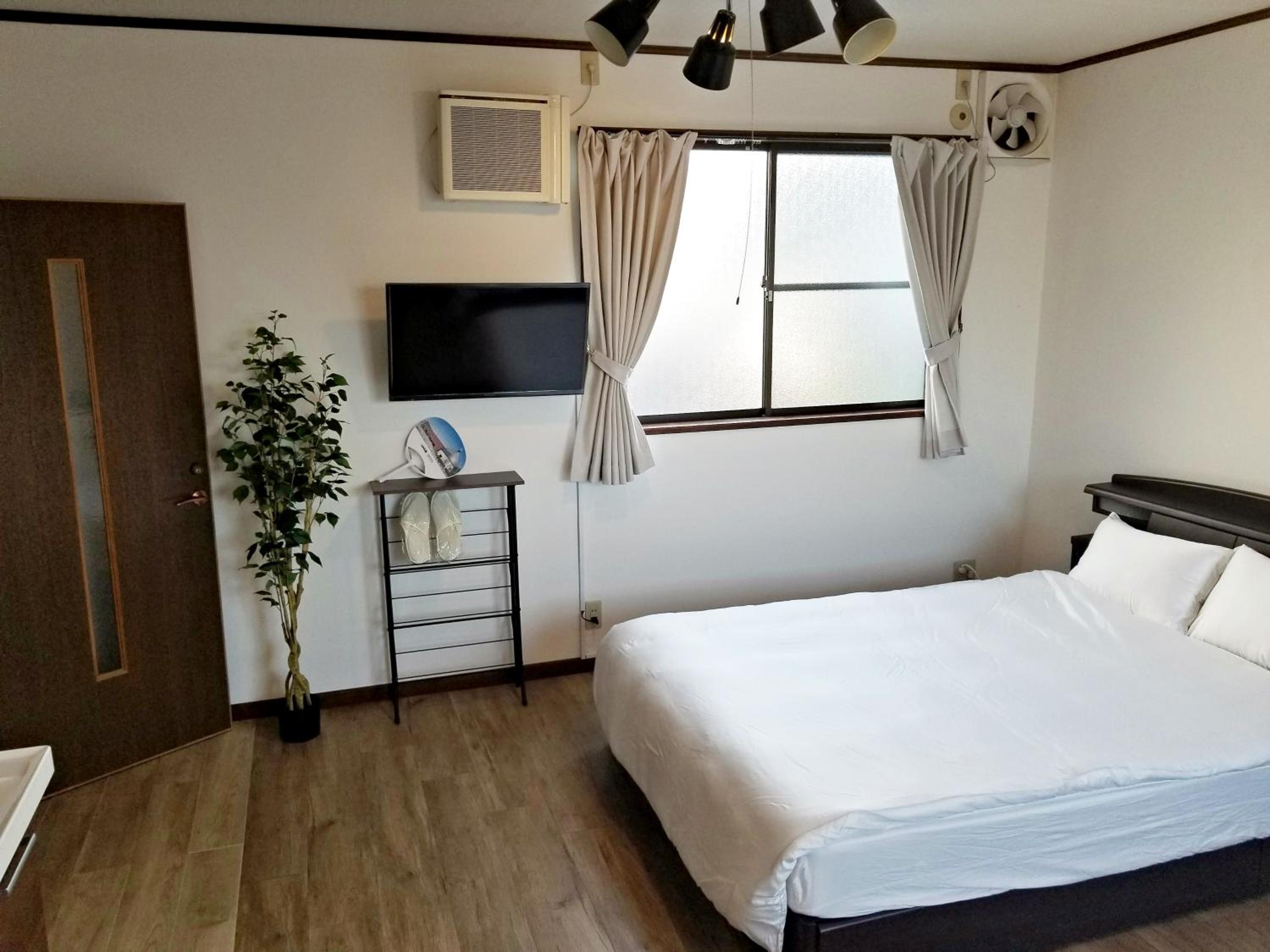 Two-Bedroom Apartment - Photo 22
