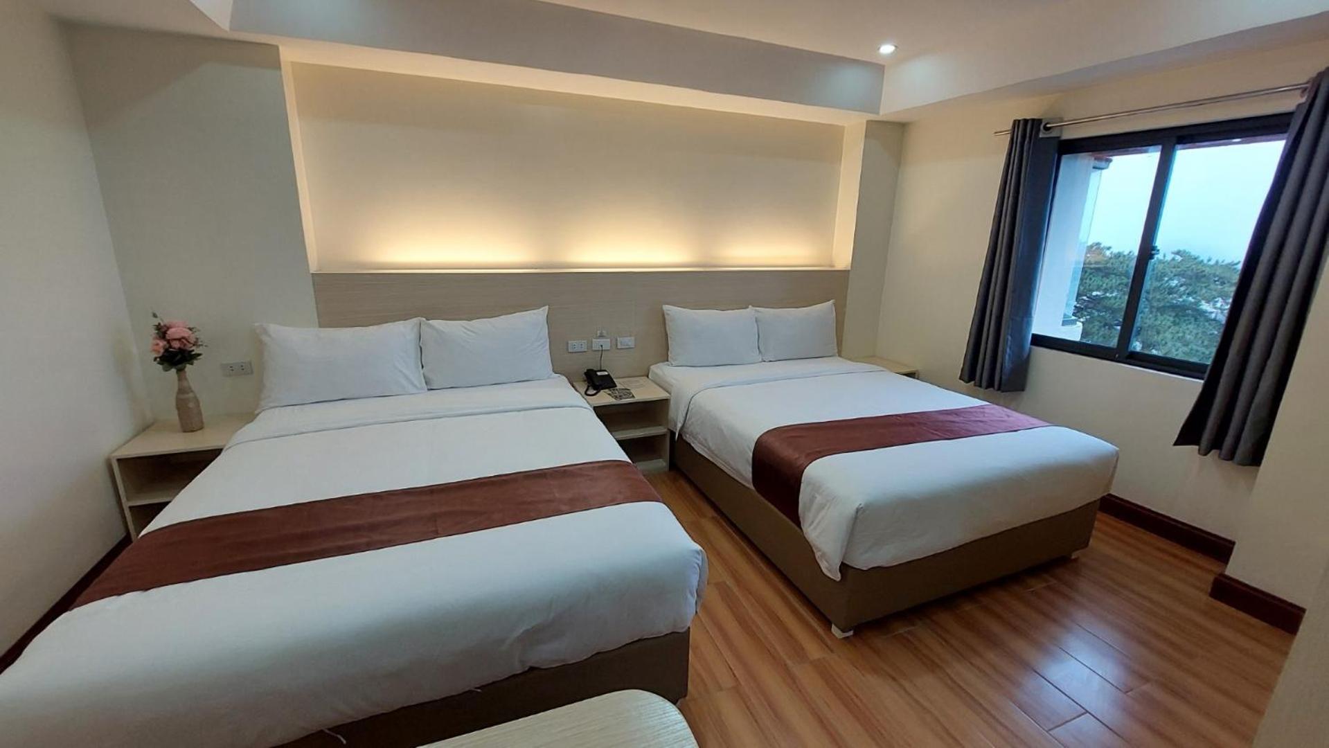 Deluxe Quadruple Room - Photo 1