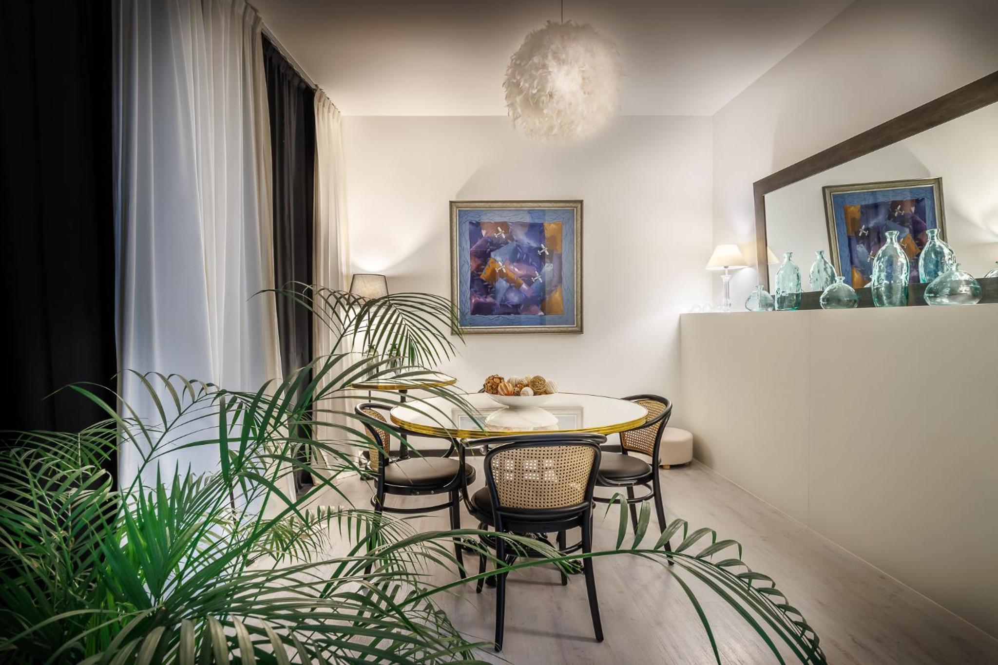 Suite Familiale avec Balcon et Accès Gratuit au Spa – Vue sur Sanctuaire