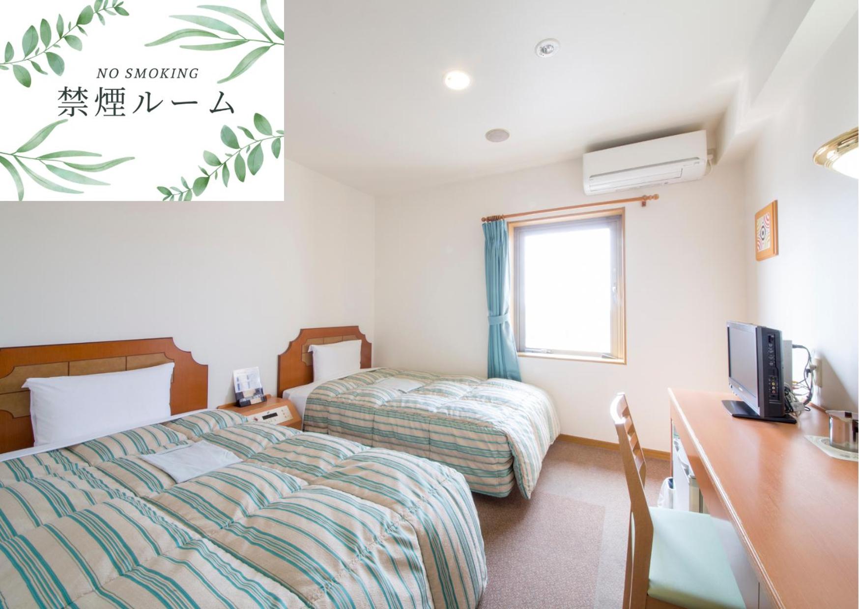 Twin Room - Non Smoking - Photo 3