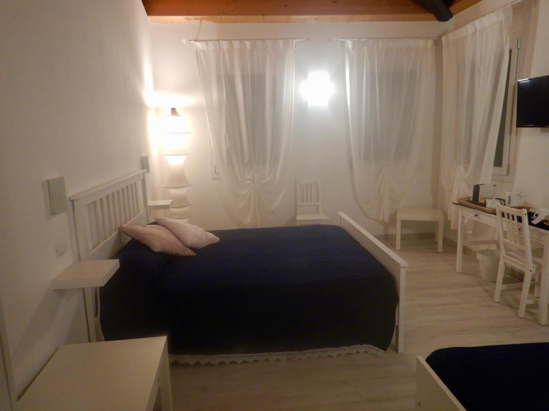 Deluxe Room - Photo 1