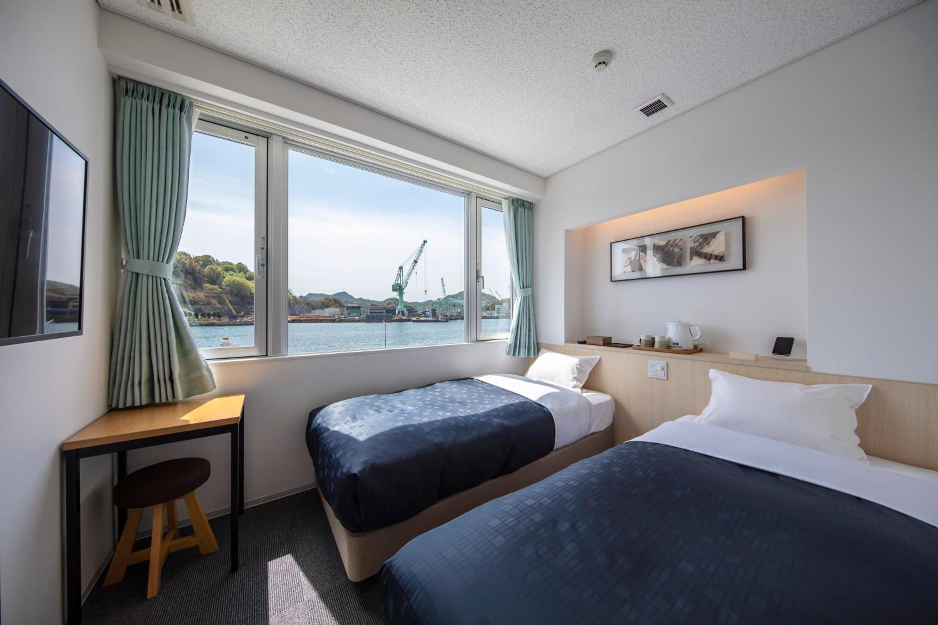 Standard Twin Room with Sea View - Photo 1